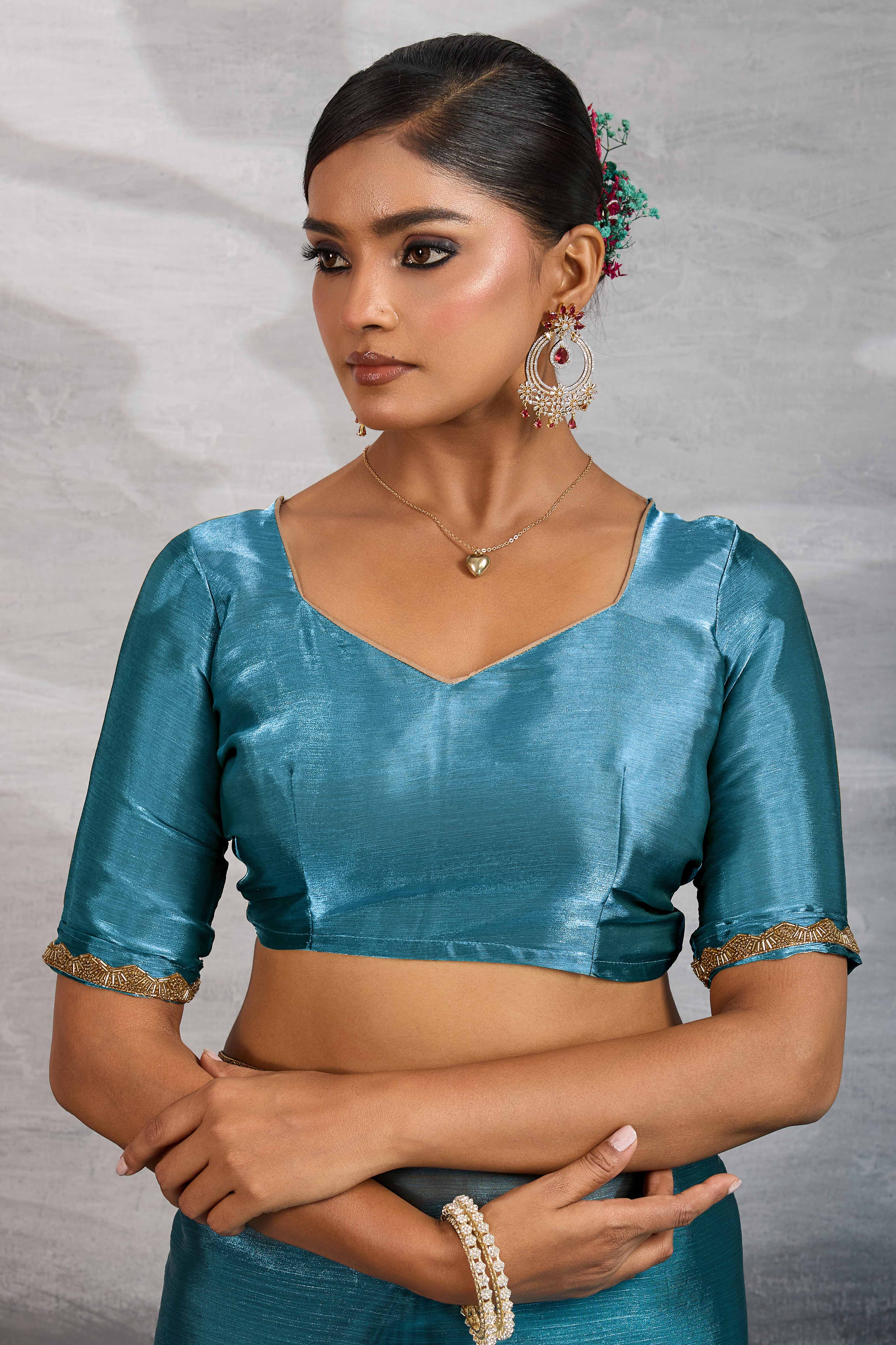 Solid Teal Chiffon Saree Featuring Beads Embellished Border