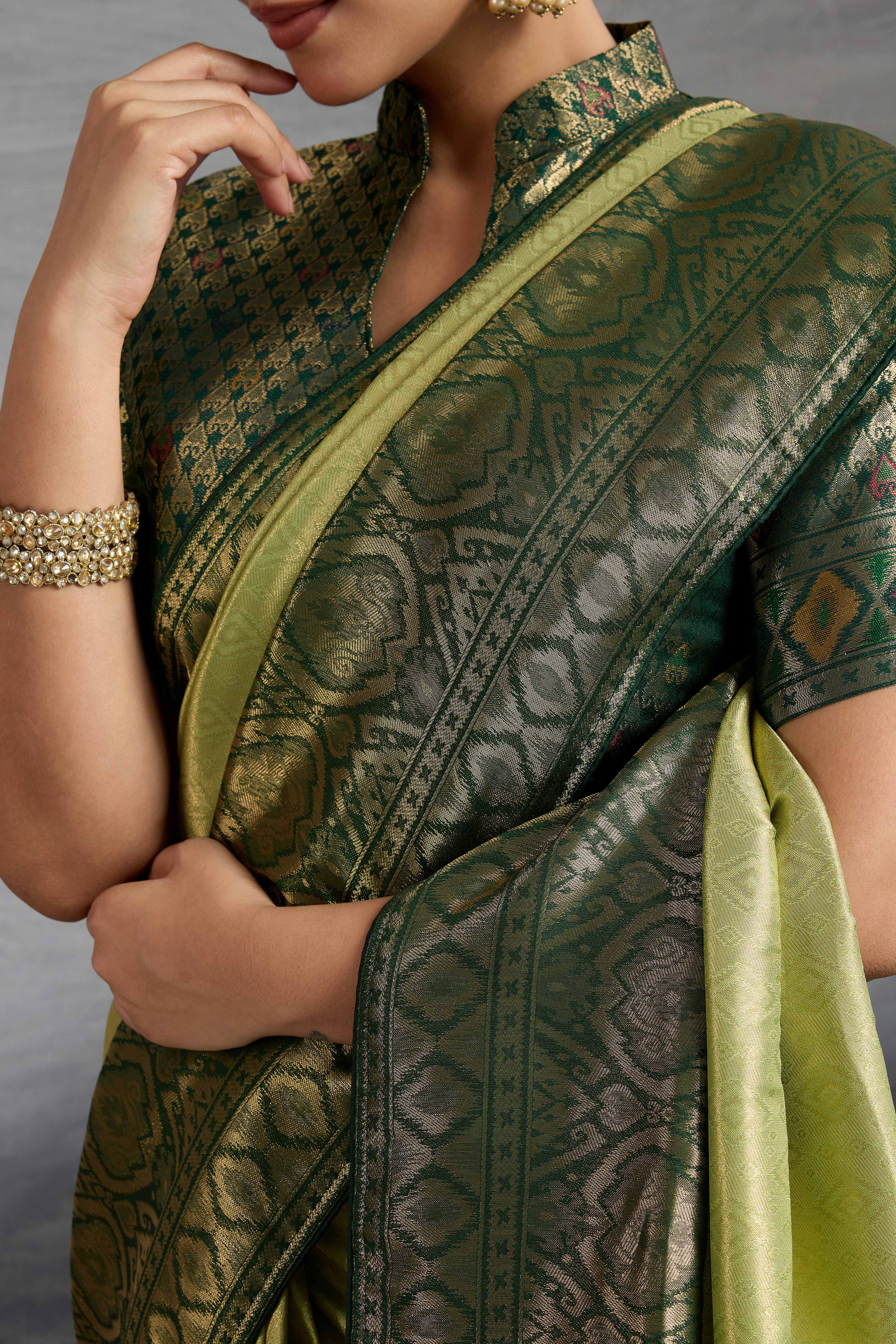 Olive Green Kanjivaram Silk Saree With Traditional Kadiyal Style Zari Weaving &  Meenakari Pallu