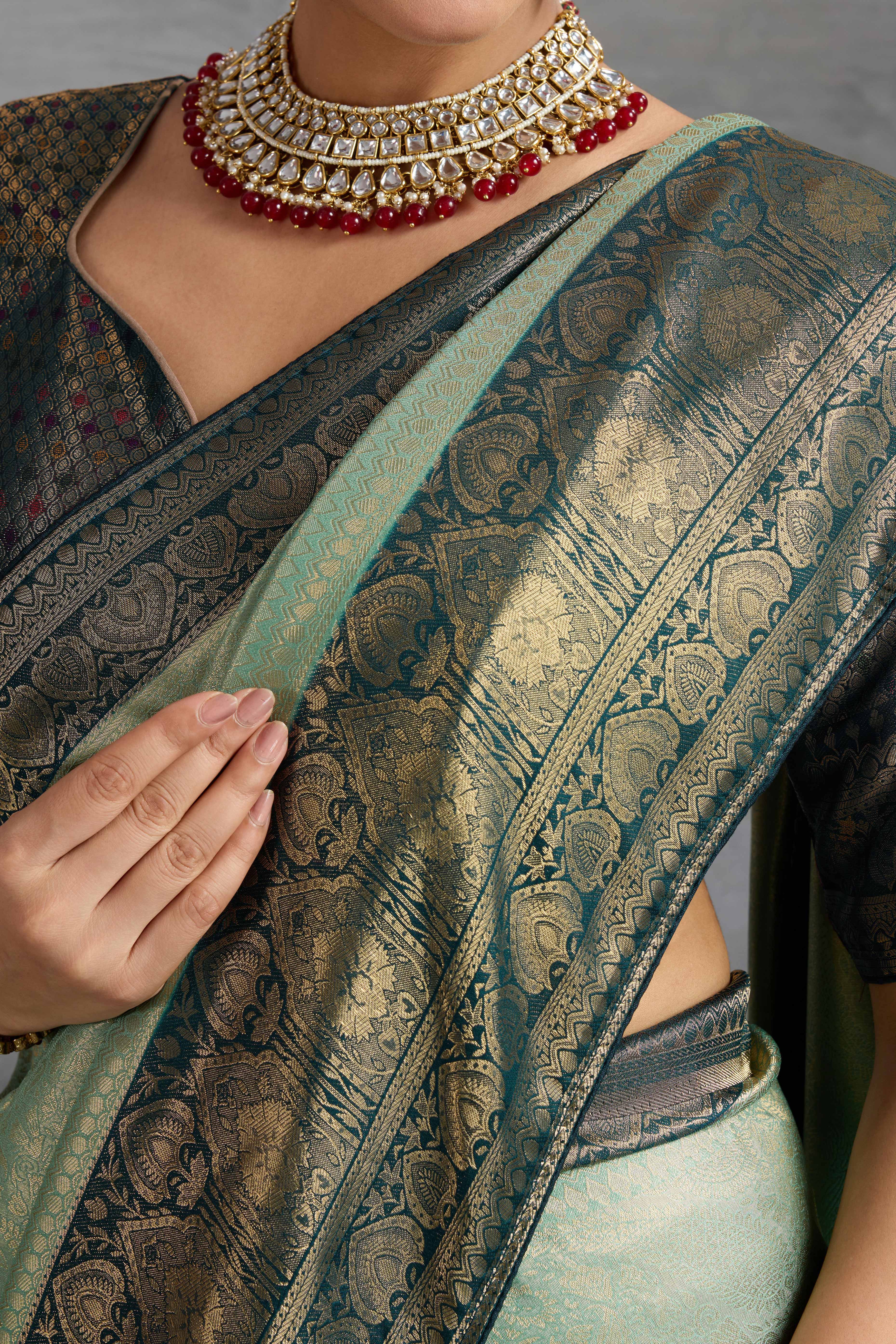 Mint Green Kanjivaram Silk Saree In Kadiyal Style Zari Weaving With Ornate Meenakari Pallu