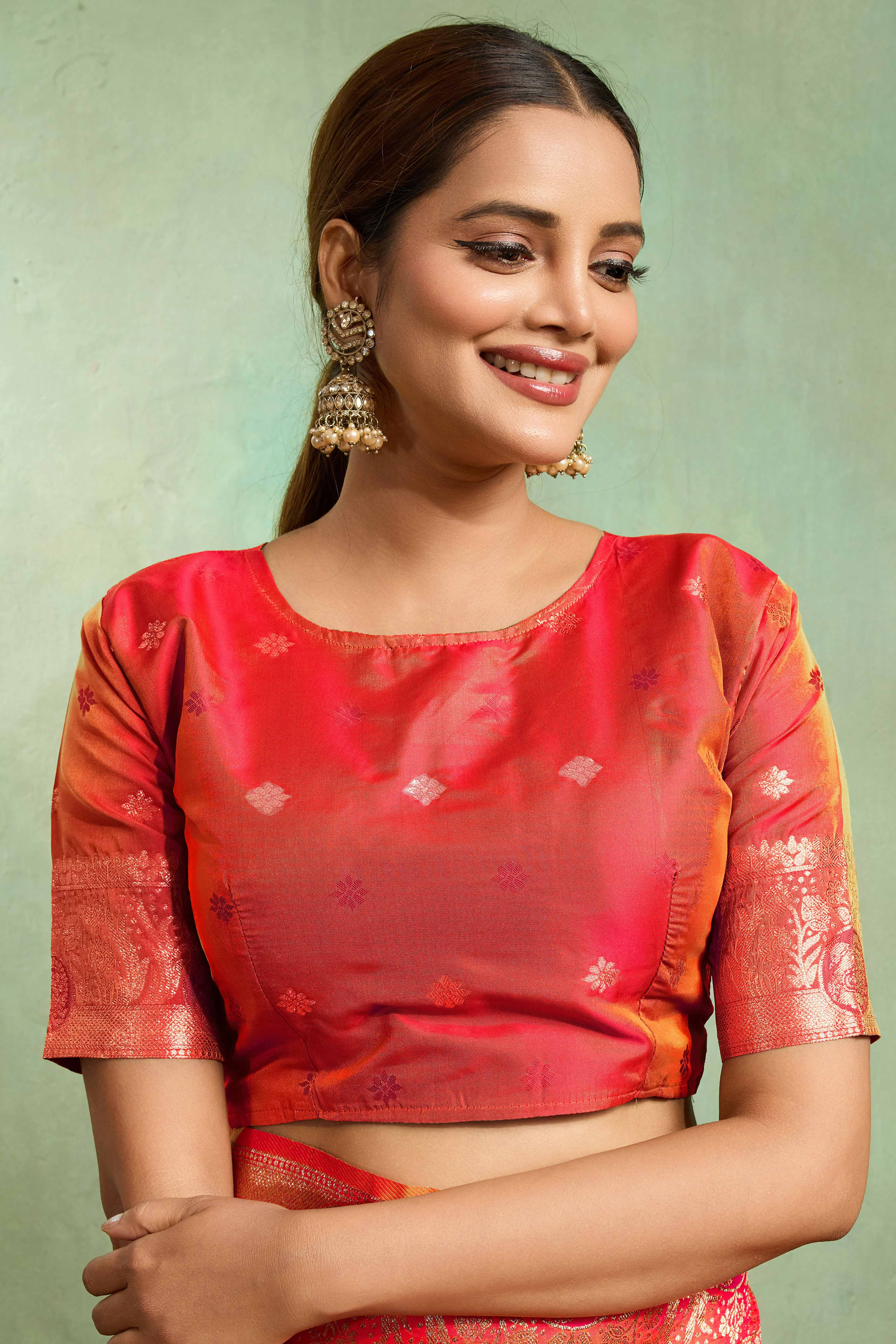 Coral Red Dual Tone Banarasi Silk Saree Accented with Meenakari Weaves