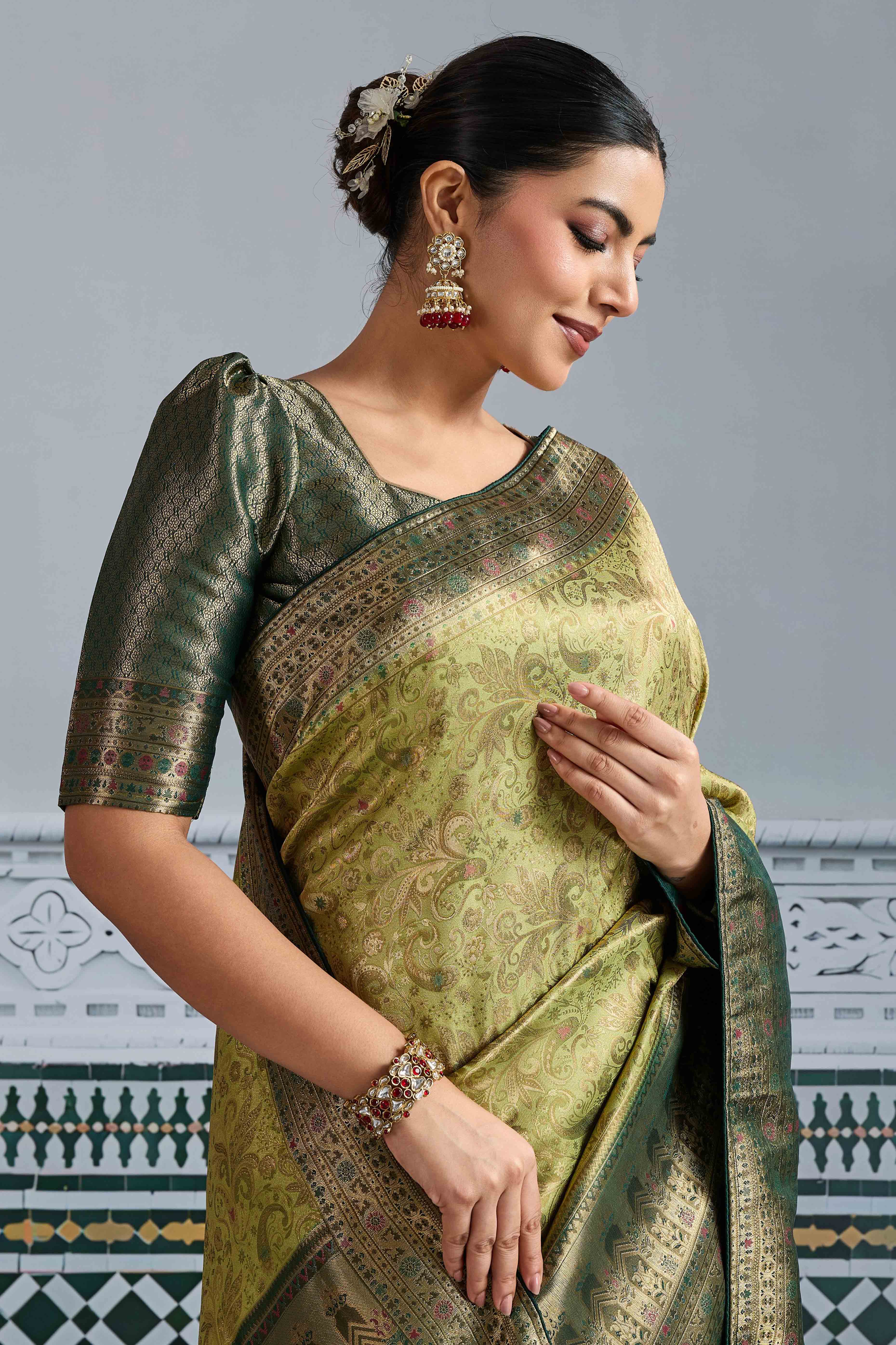 Pista Green Floral Meenakari Weaving Kanjivaram Silk Saree With Rich Piping & Tassel Pallu