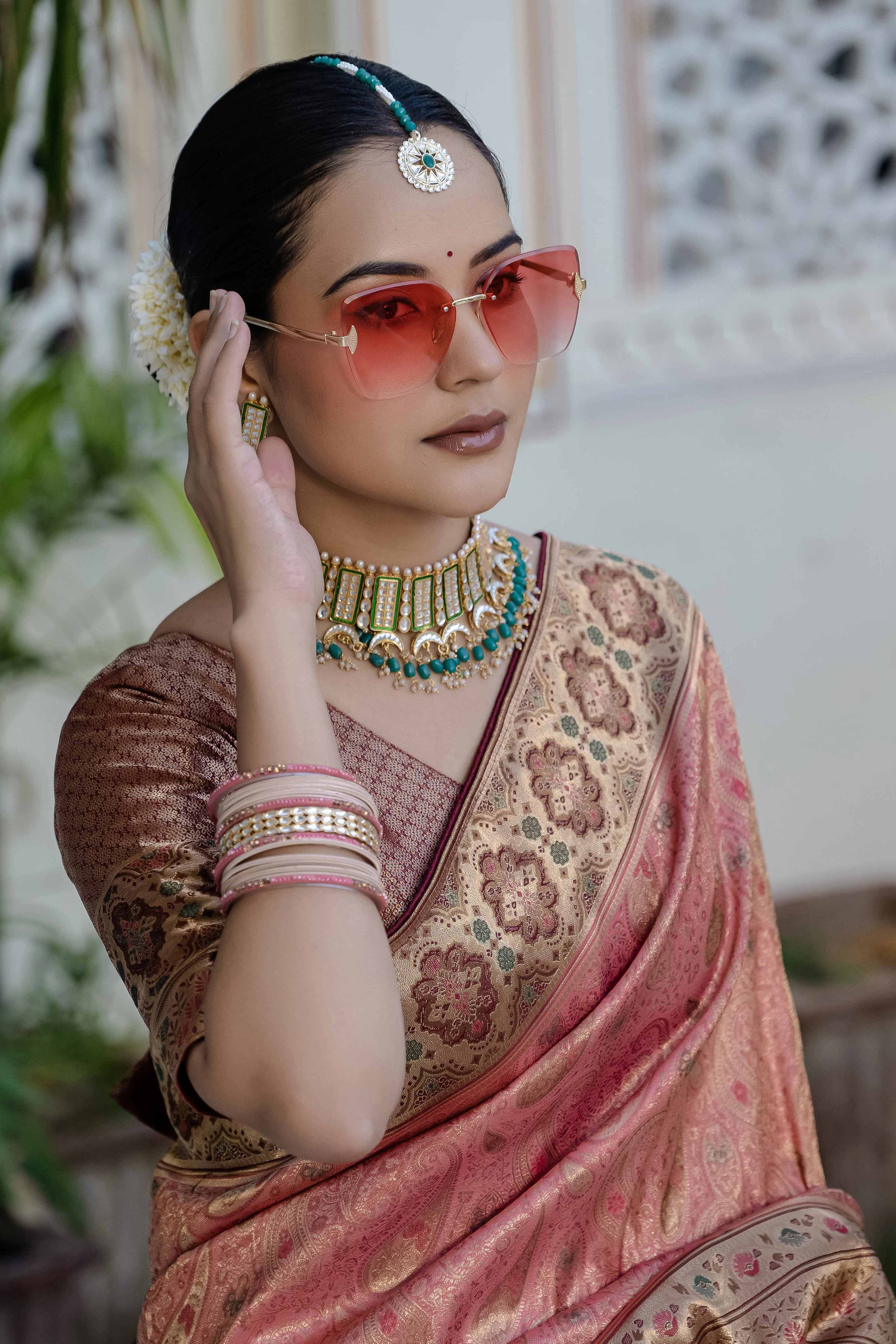 Gajari Pink Kanjivaram Silk Saree Showcasing Floral Meenakari Zari Weaving With Piping & Tassels