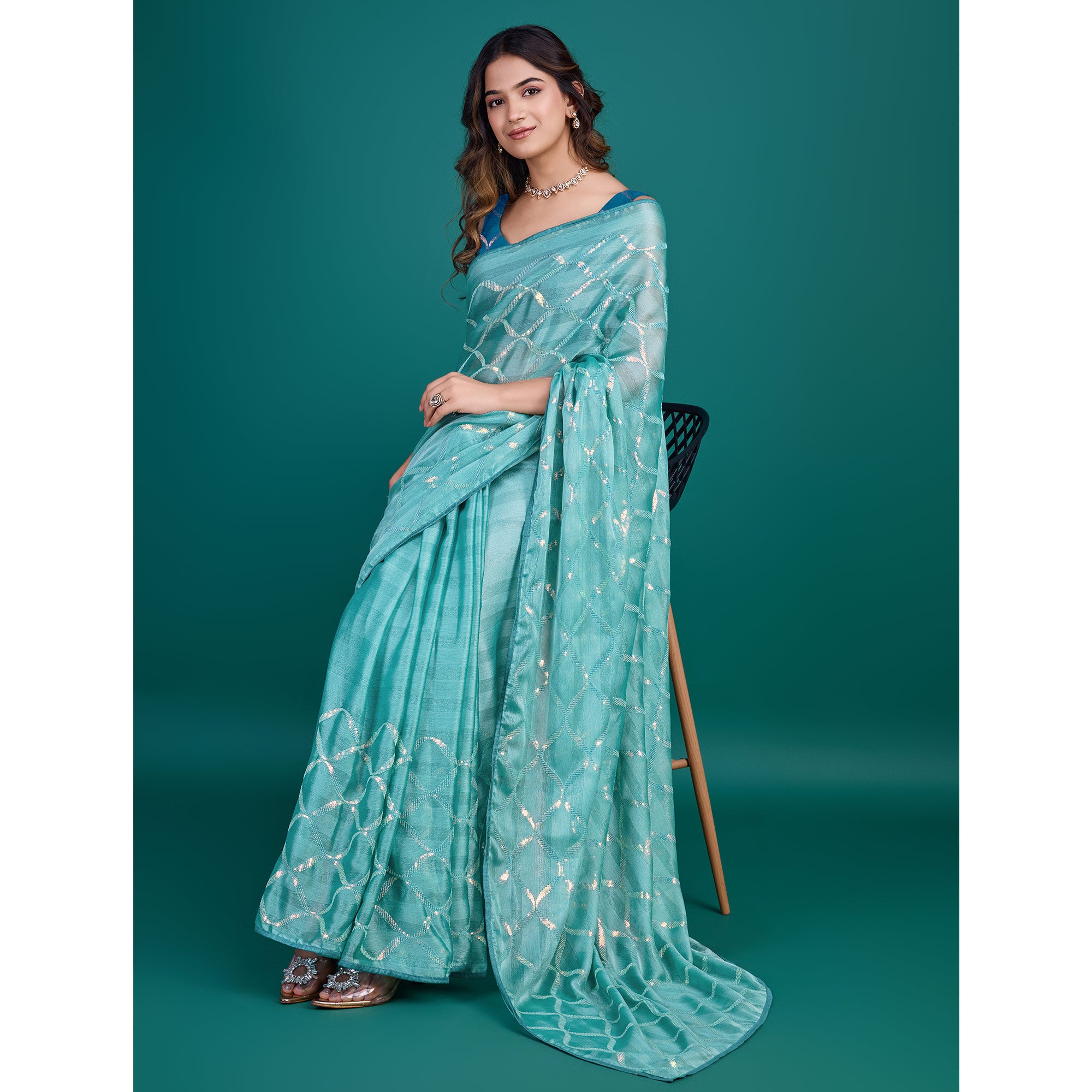 Turquoise Sequins Embroidered Georgette Saree