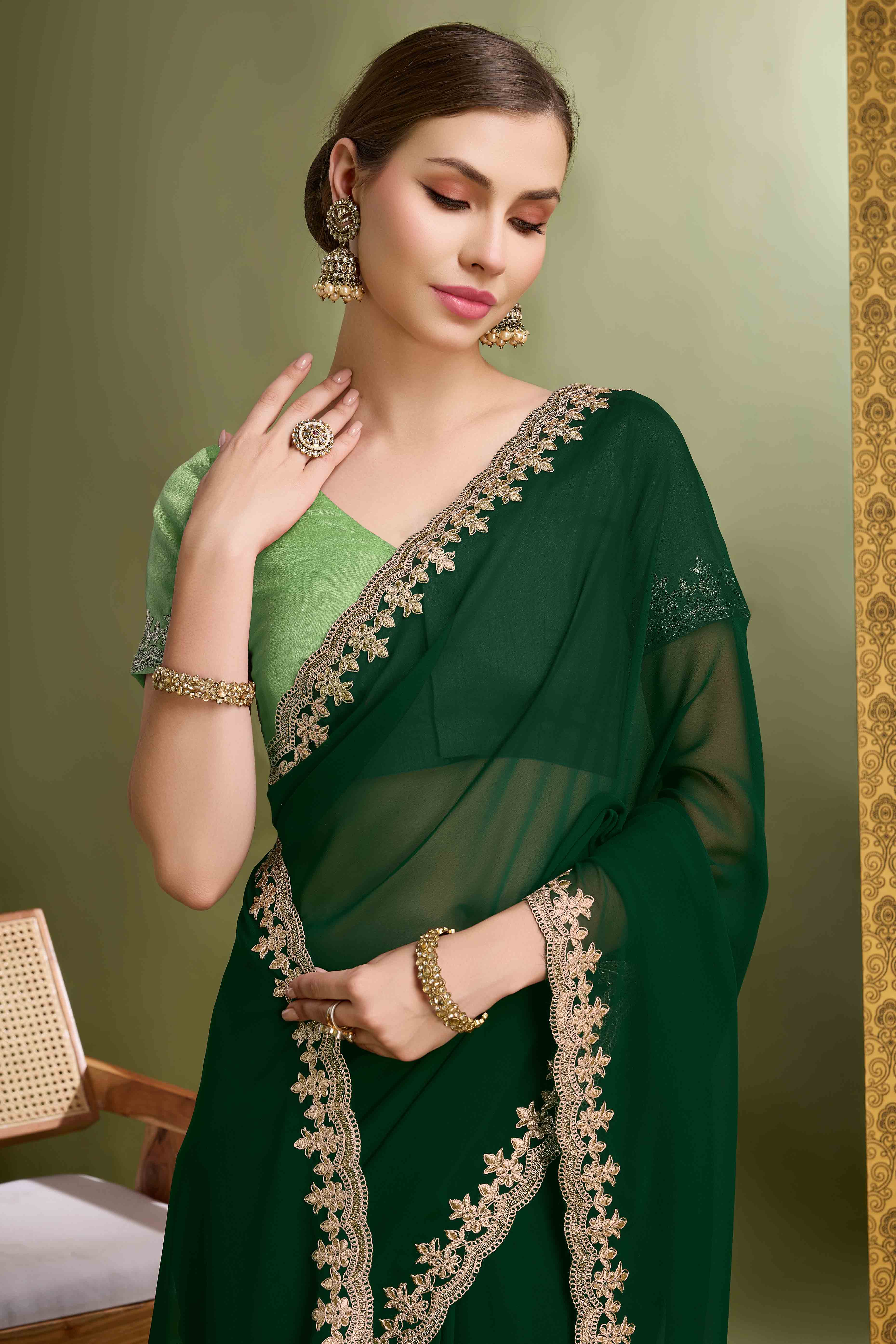 Green Solid With Zari Embroidered Georgette Saree