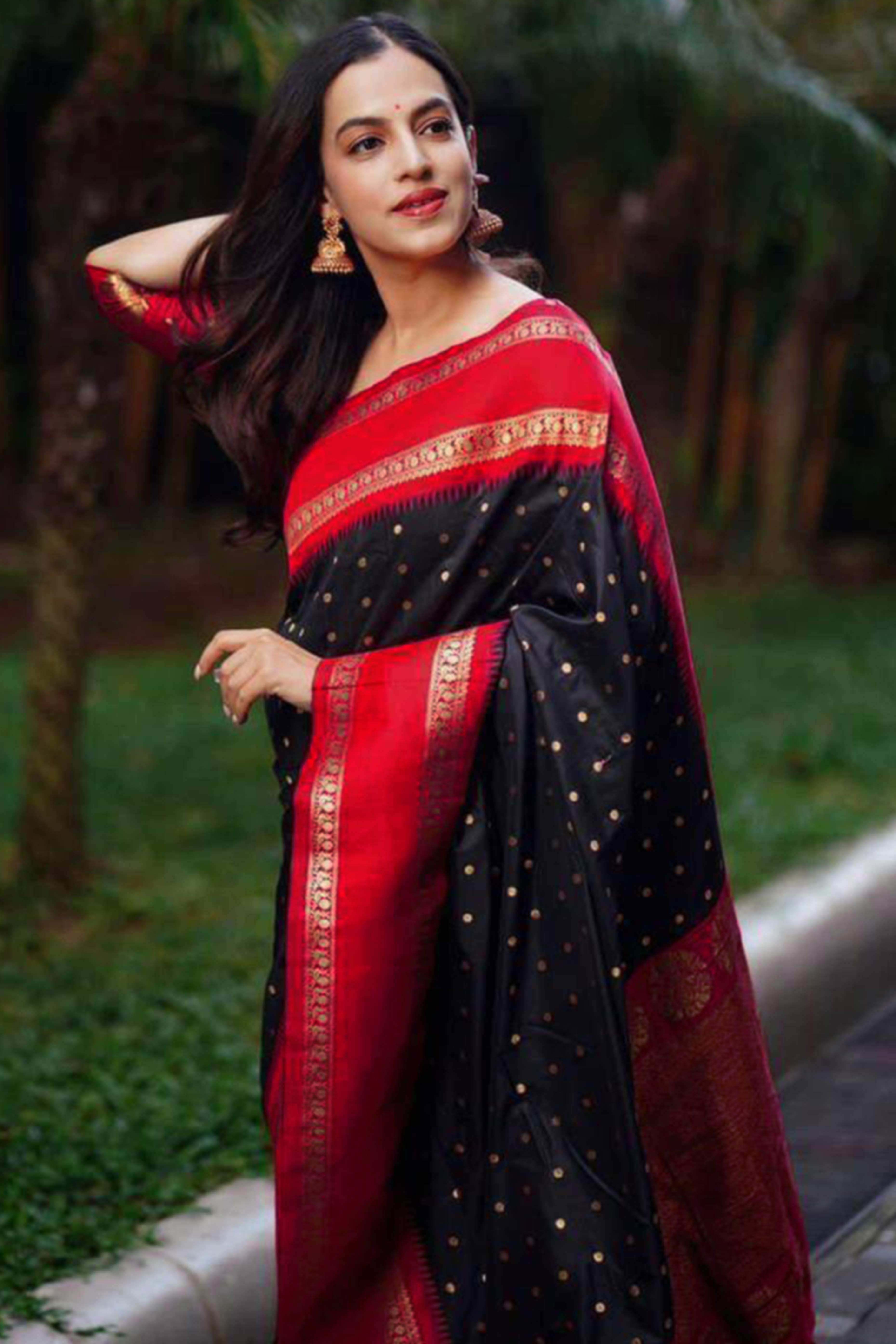 Striking Black & Red Zari Woven Lichi Banarasi Silk Saree With Tassel Accents