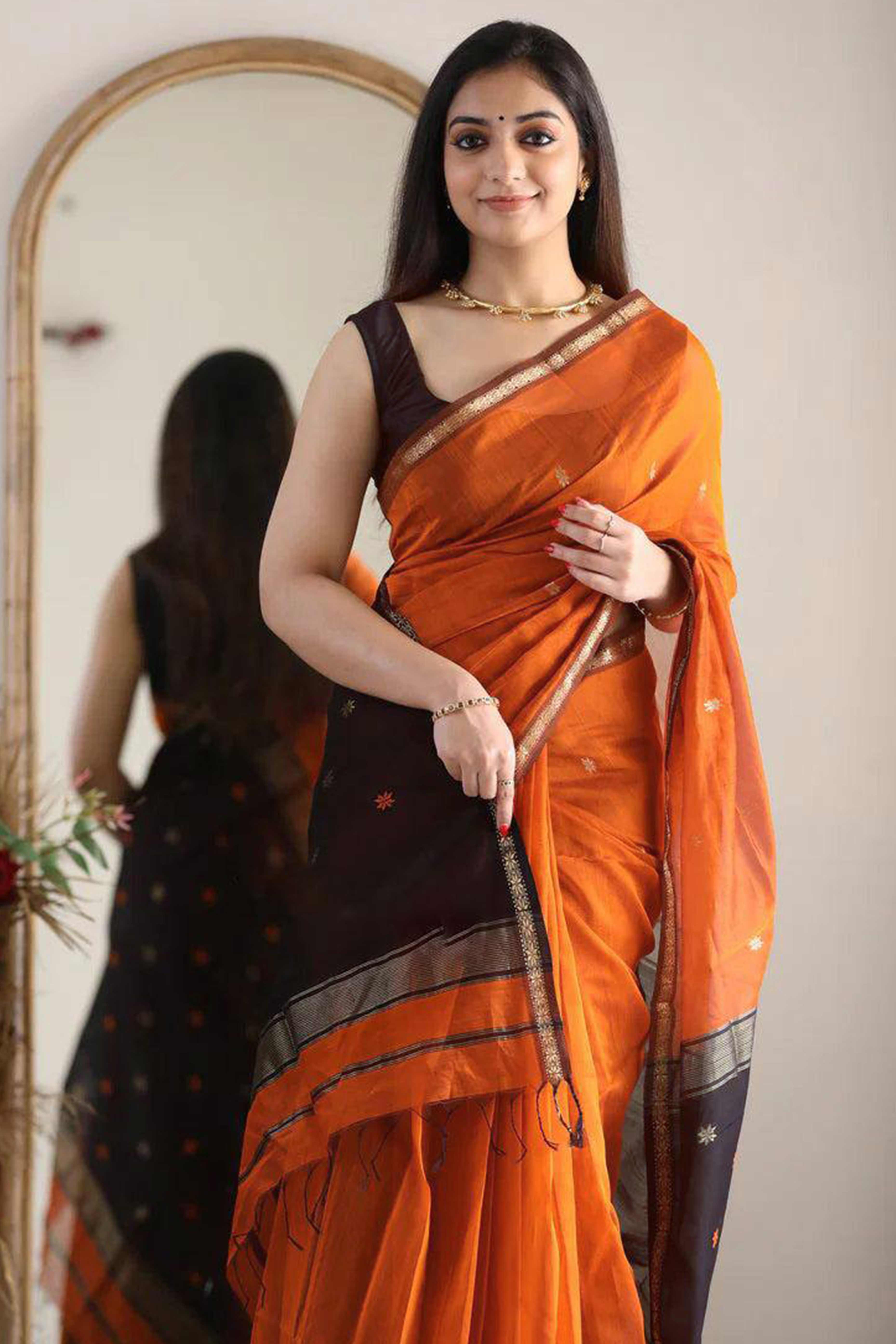 Burnt Orange Linen Cotton Saree with Zari Butti Embellishment
