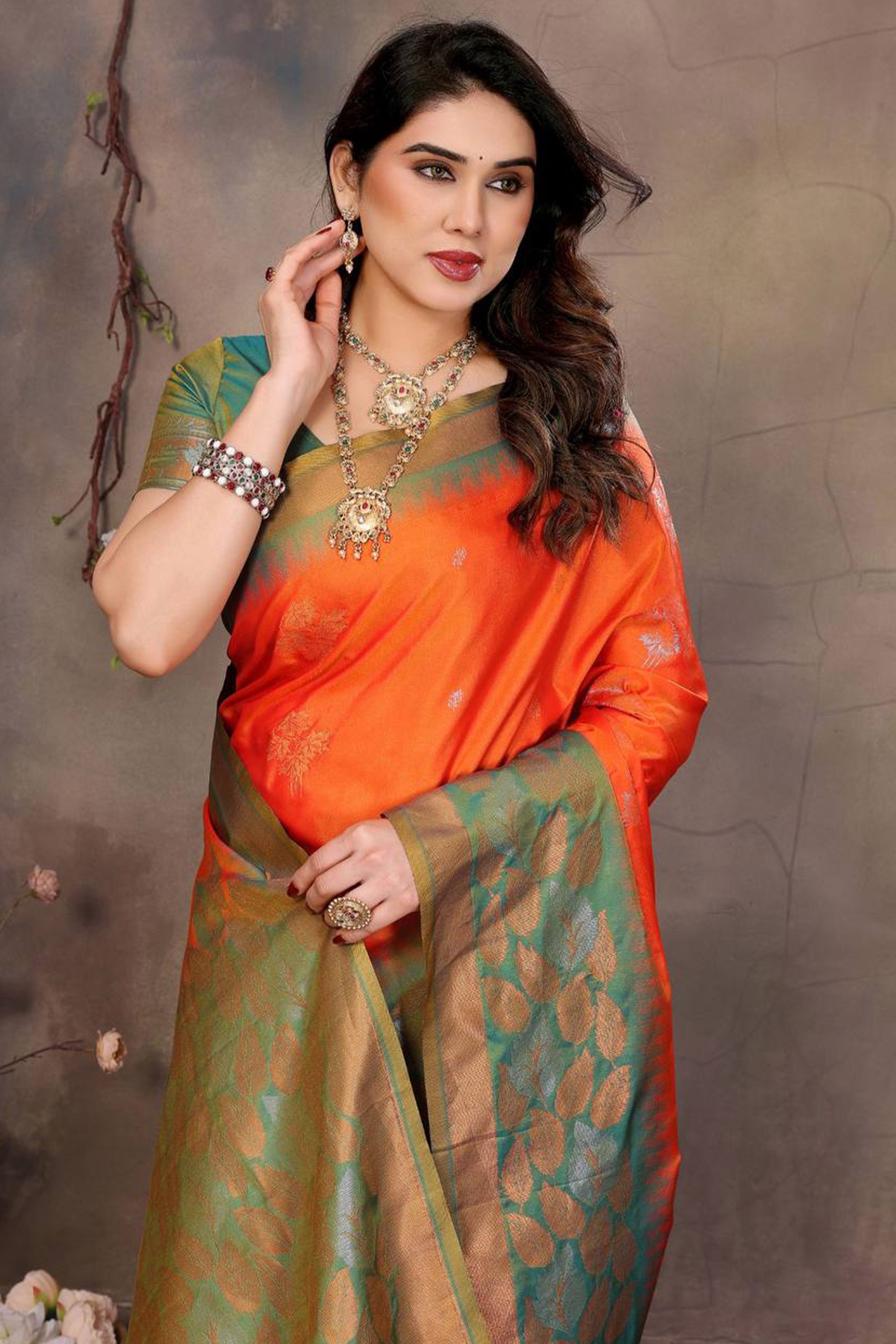 Orange Leaf & Floral Motif Banarasi Silk Saree With Luxurious Zari Weaving Two Tone Weaving
