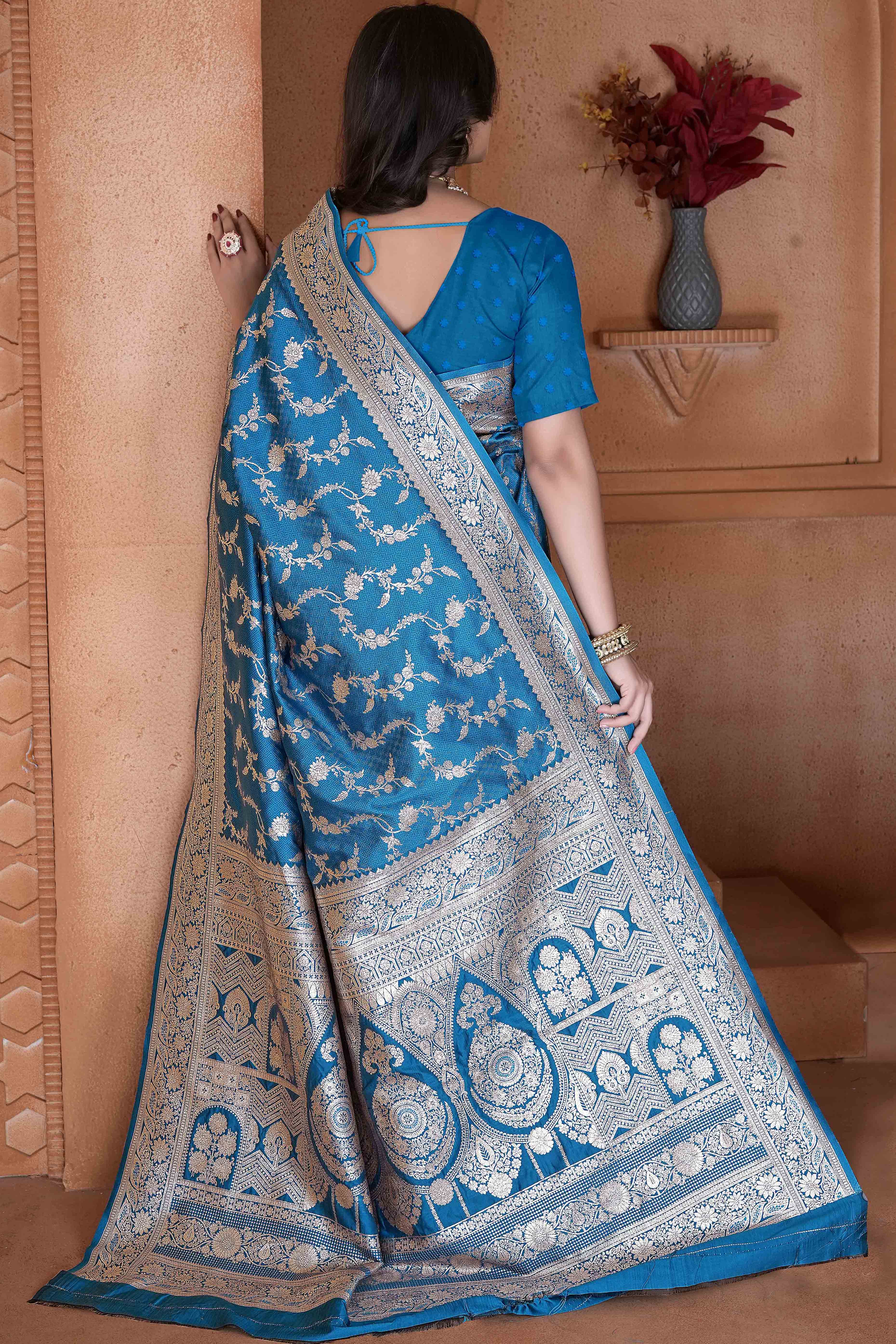 Blue Saree in Art Silk Featuring Traditional Zari Woven Floral Motifs for Special Occasions