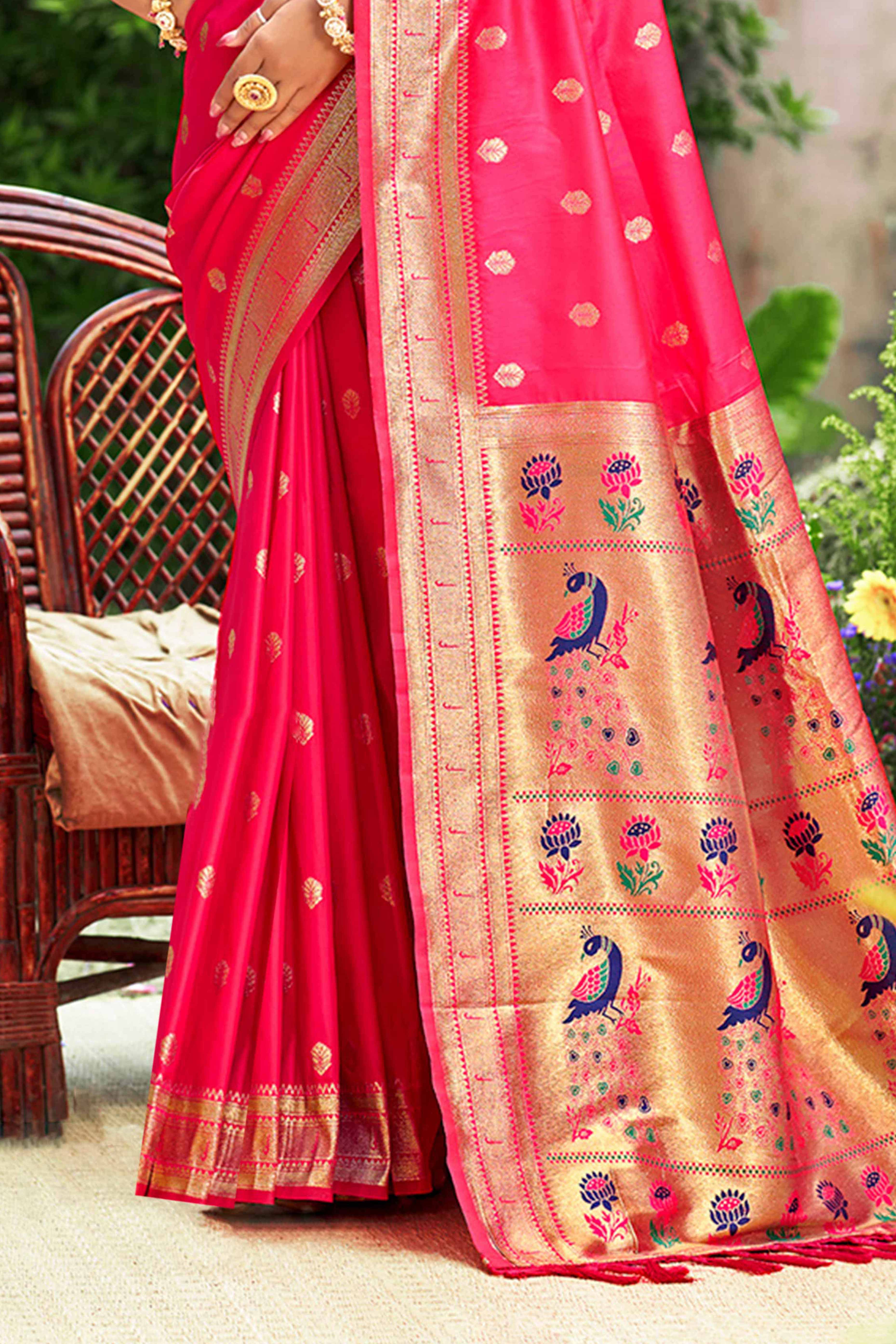 Rani Pink Zari Weaving Silk Blend Saree Adorned With Intricate Peacock Motif Pallu & Graceful Tassel