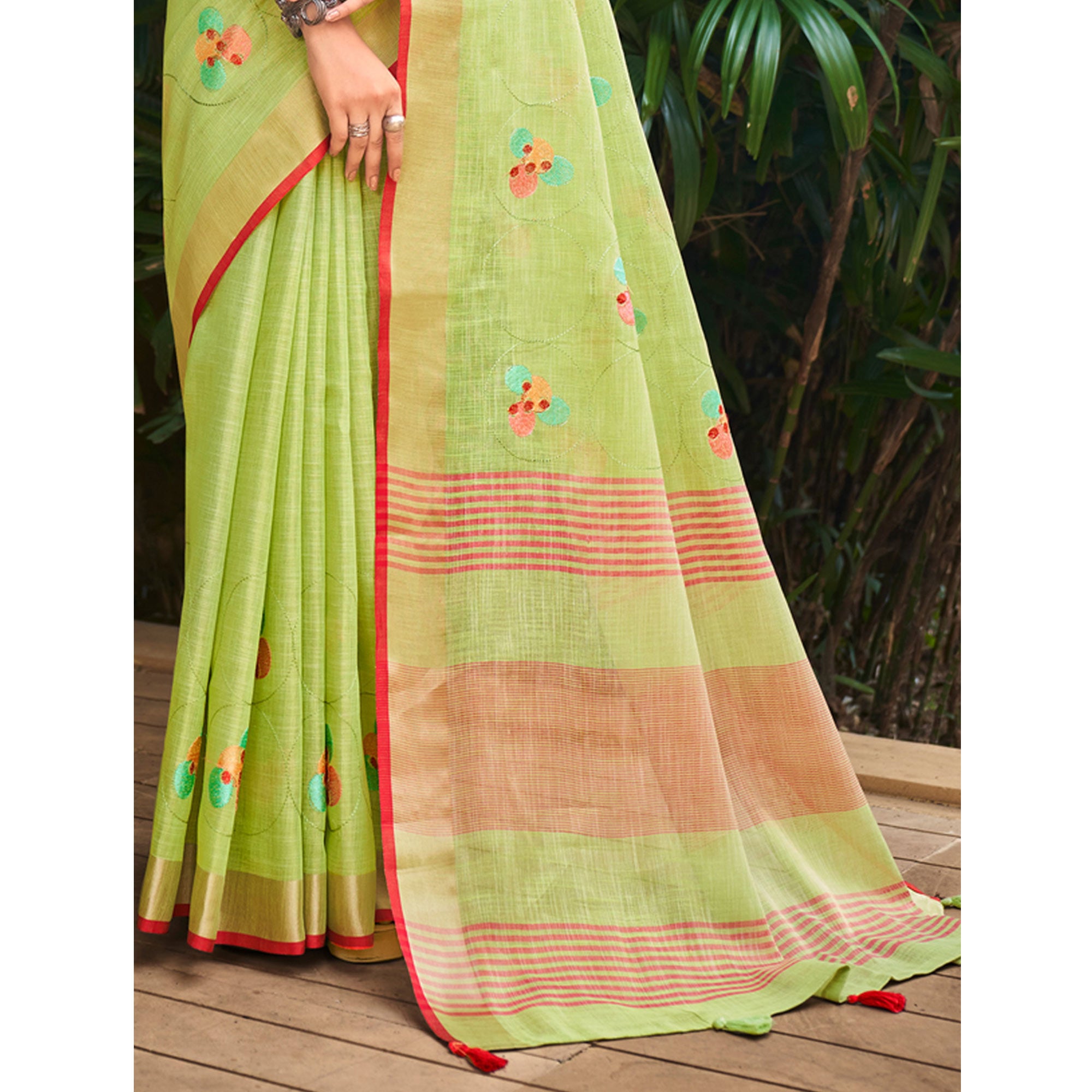 Green Floral Embroidered Linen Saree With Tassels