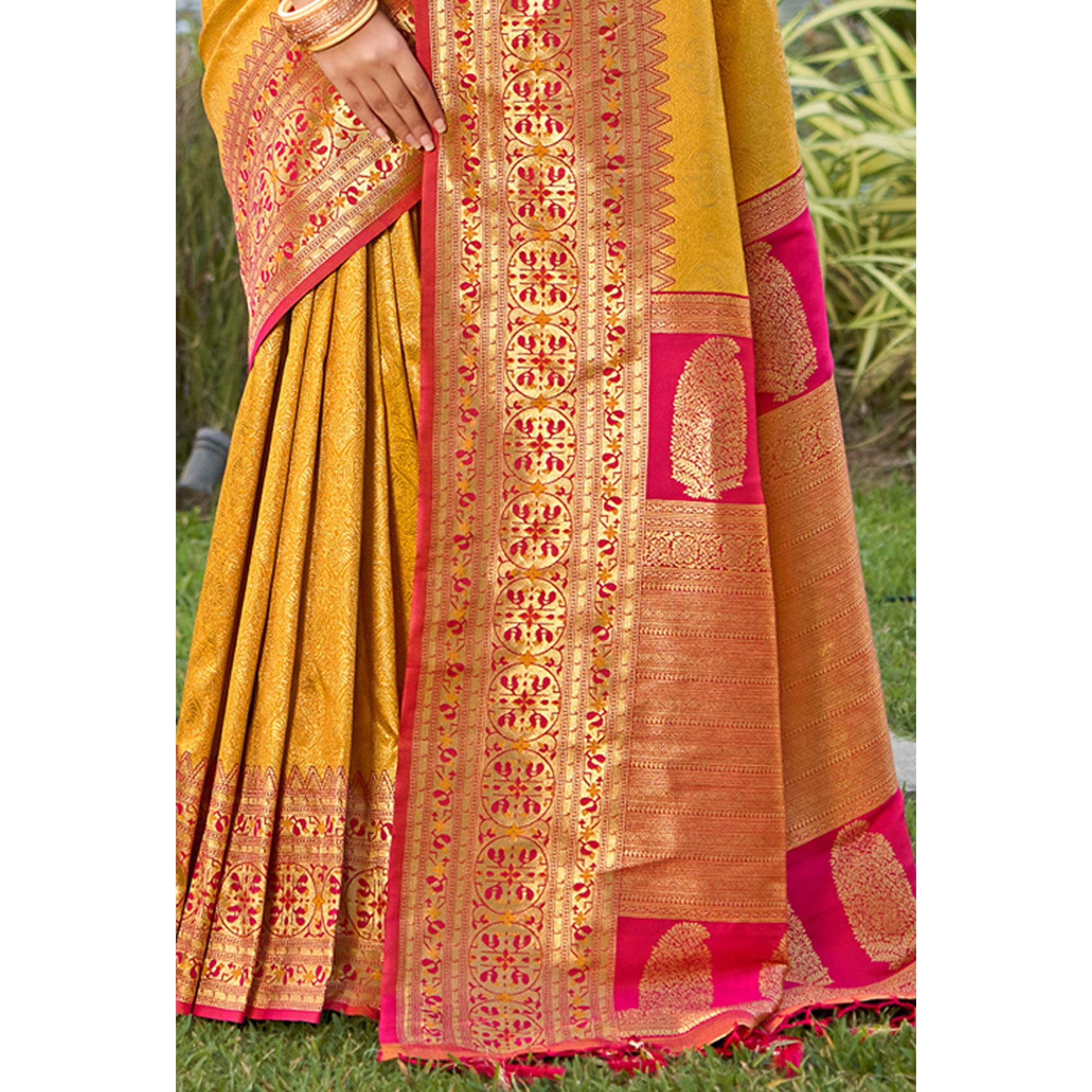 Mustard Woven Kanjivaram Silk Saree With Tassels