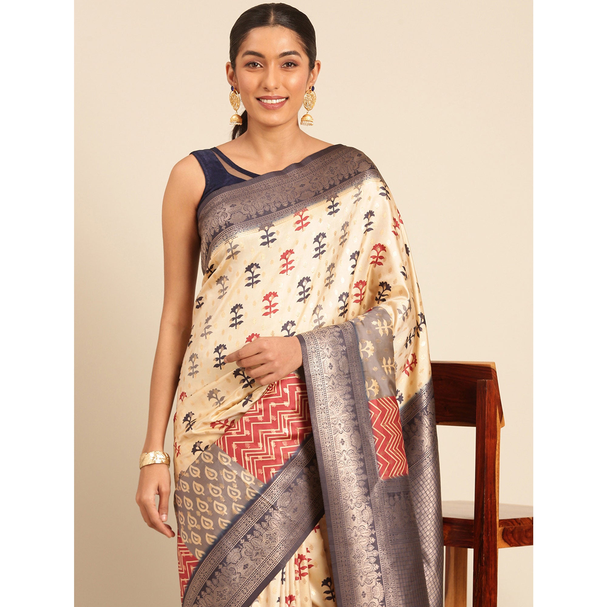 Cream Woven Banarasi Silk Saree With Tassels