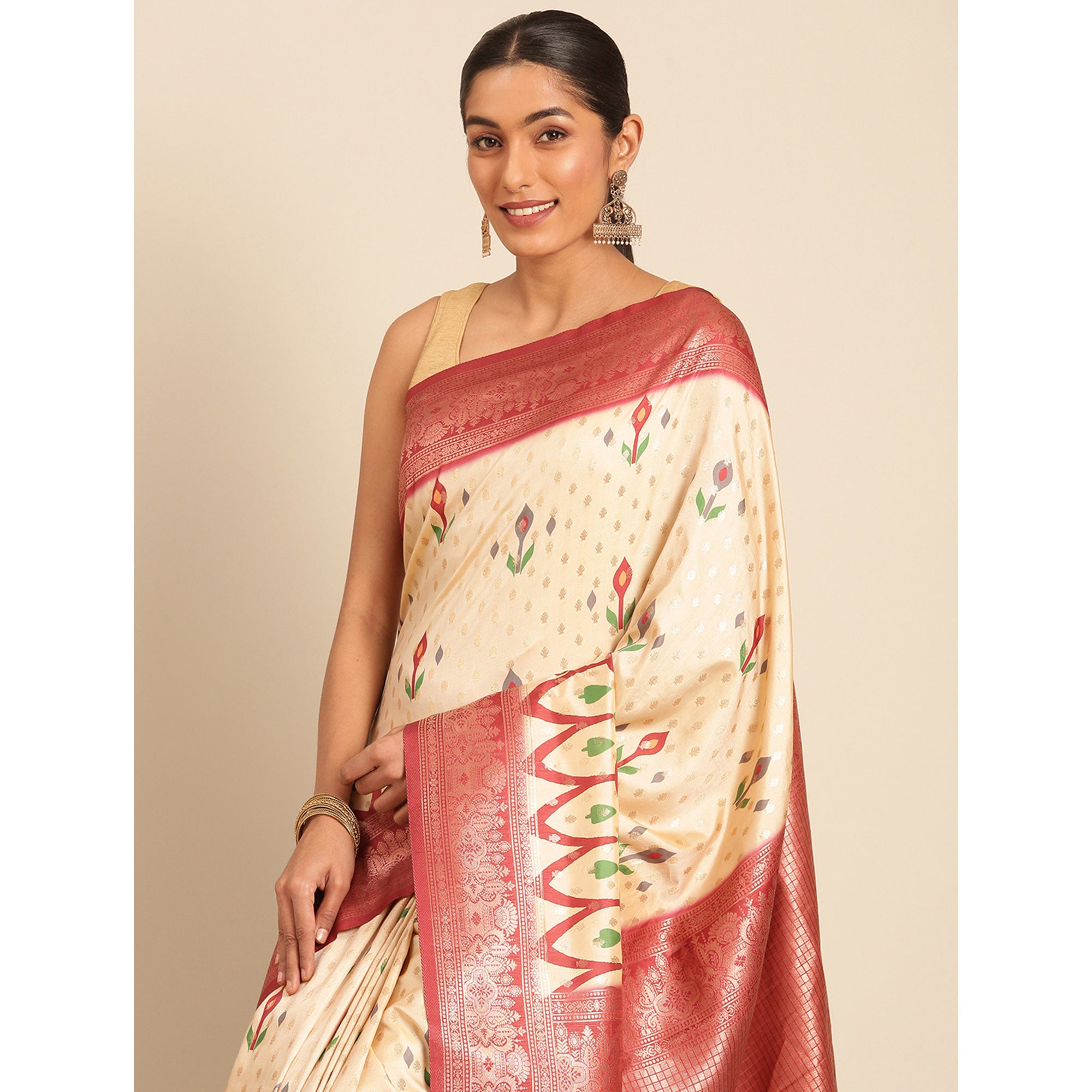 Cream Woven Banarasi Silk Saree With Tassels