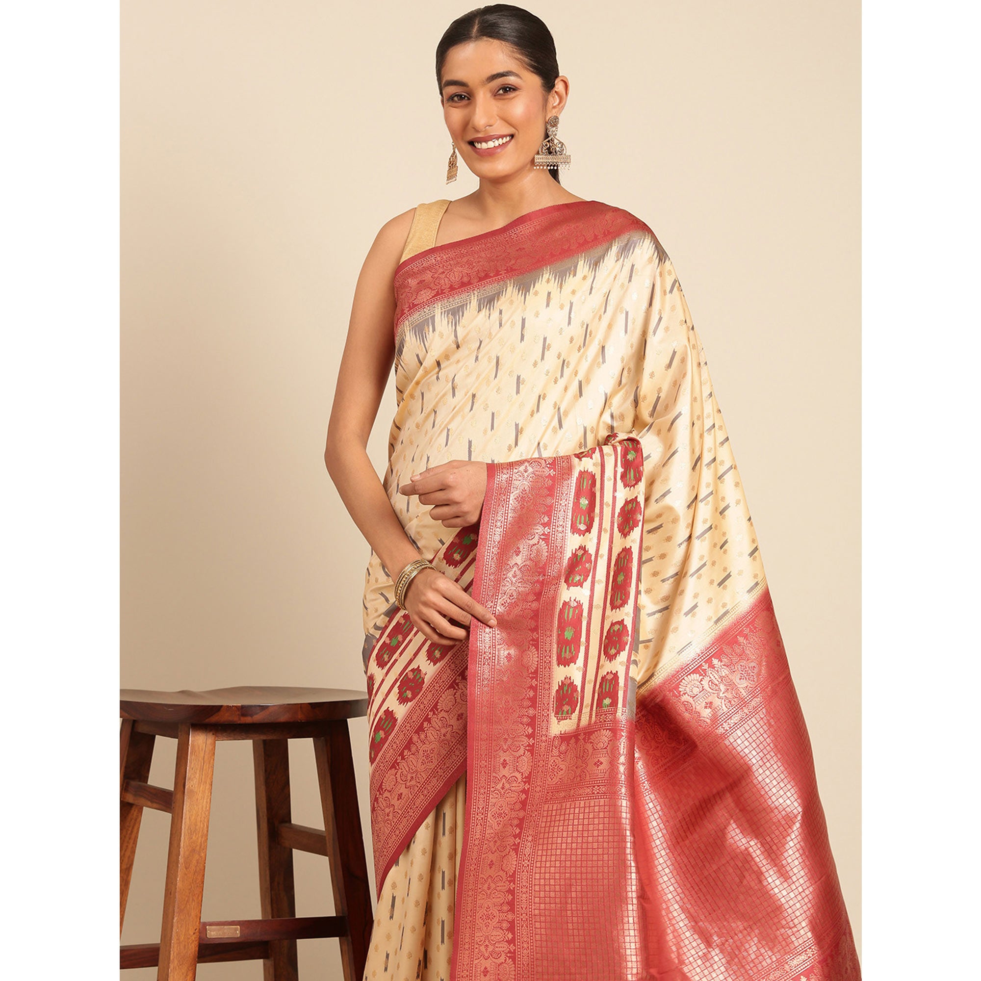 Cream Woven Banarasi Silk Saree With Tassels