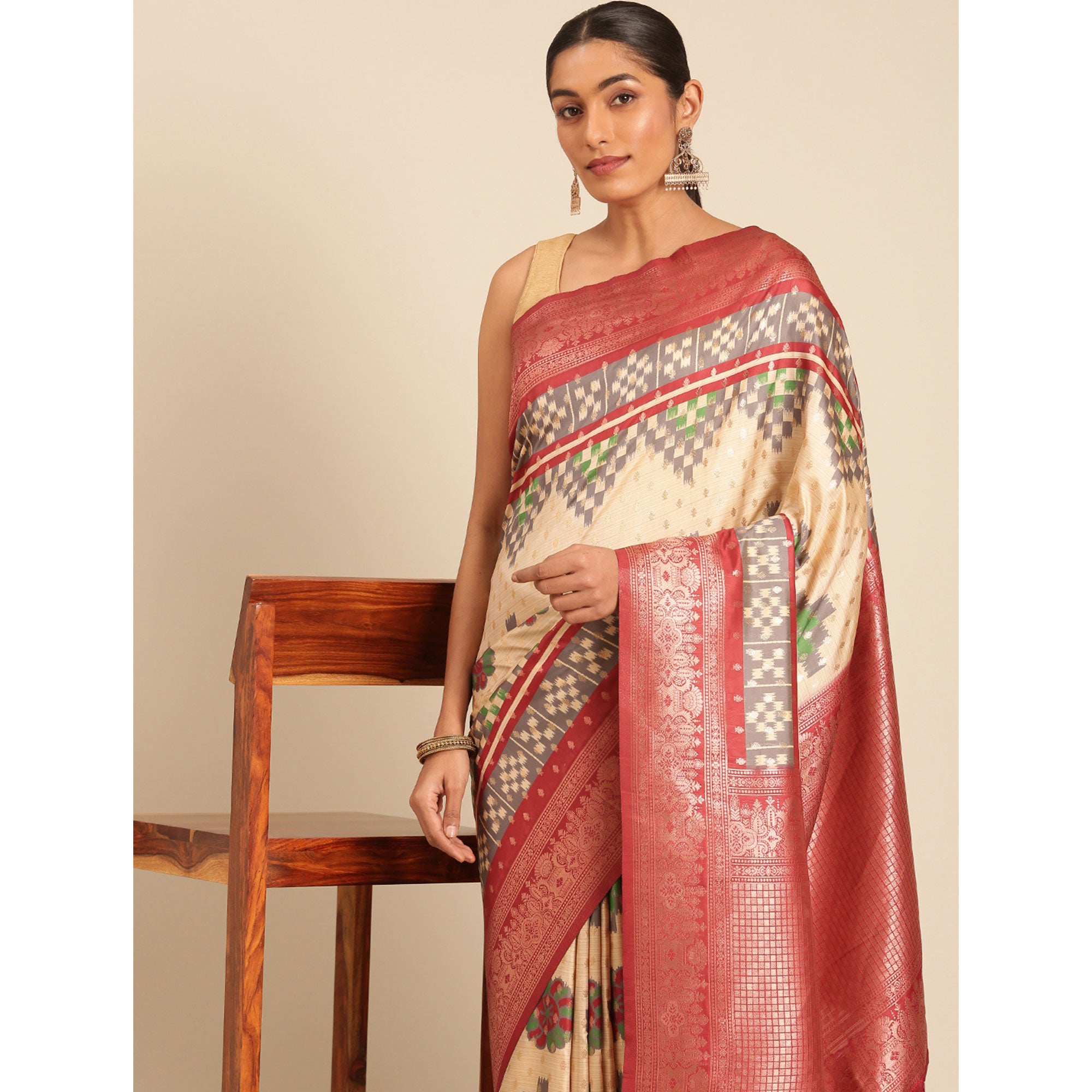 Cream Woven Banarasi Silk Saree With Tassels