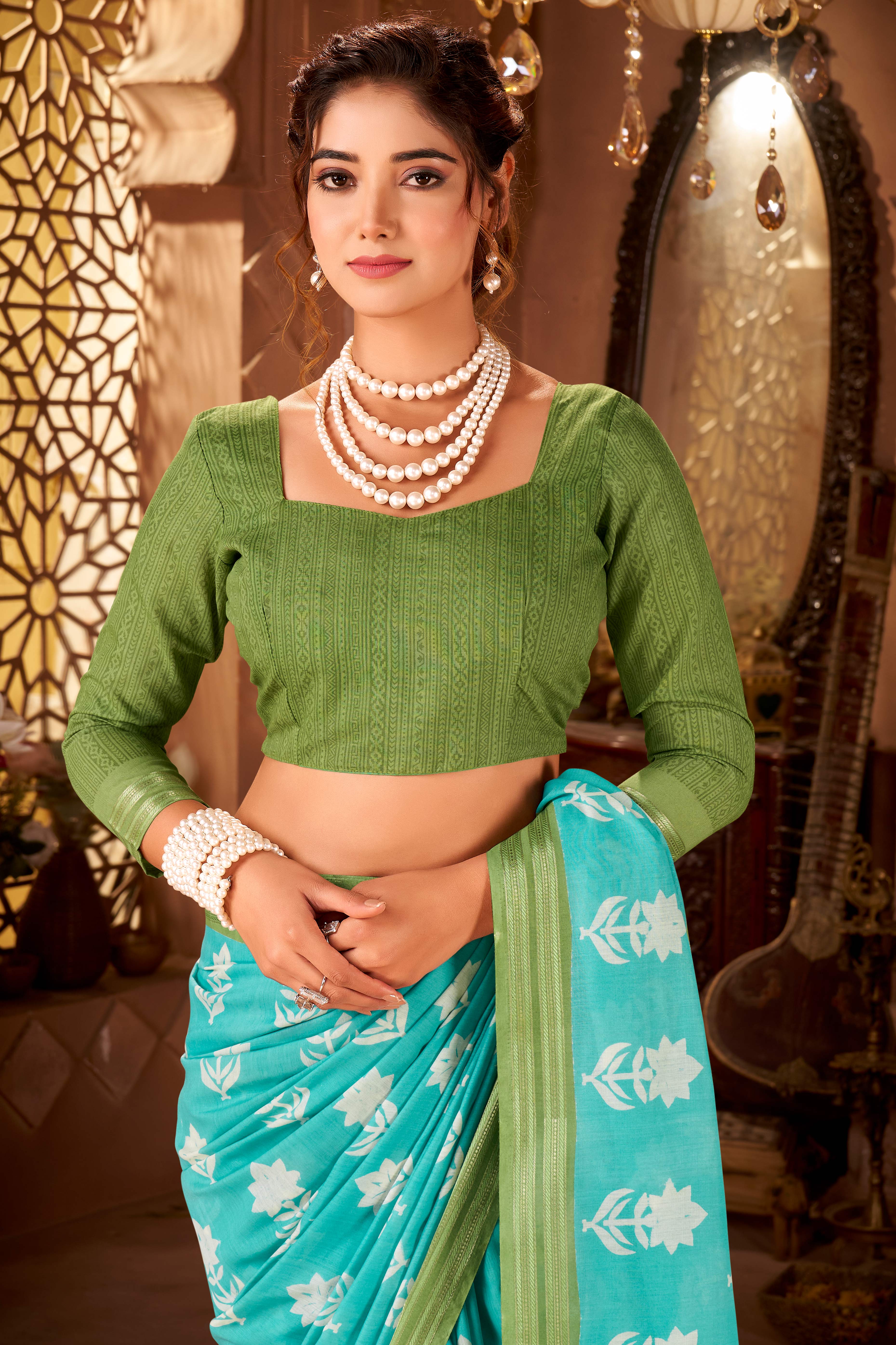 Sophisticated Blue Mulmul Cotton Saree Featuring Delicate Floral Prints & Weaving Border