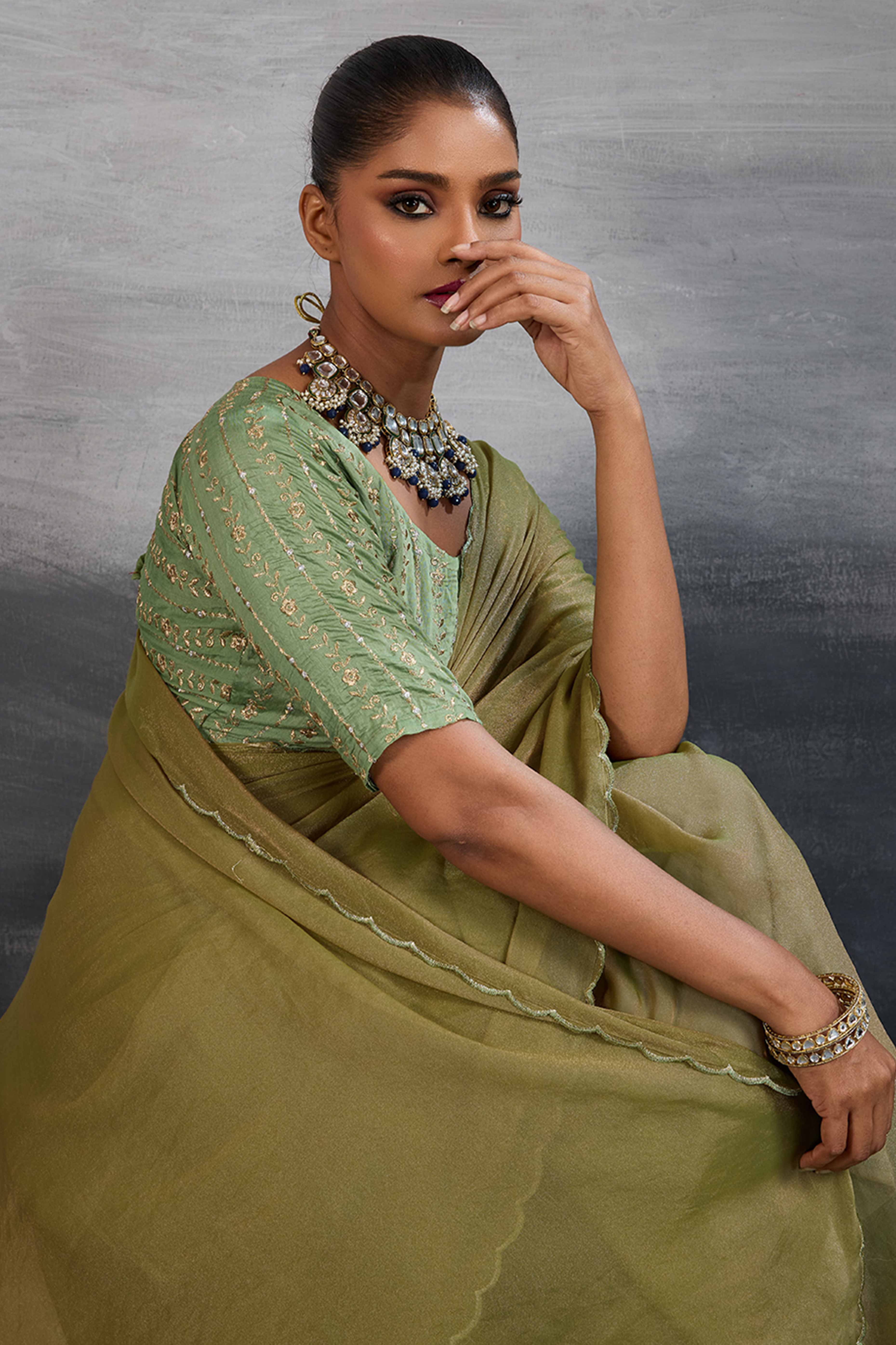Light Olive Green Solid Organza Jimmy Choo Saree Accentuated With Elegant Cutwork Border Detailing