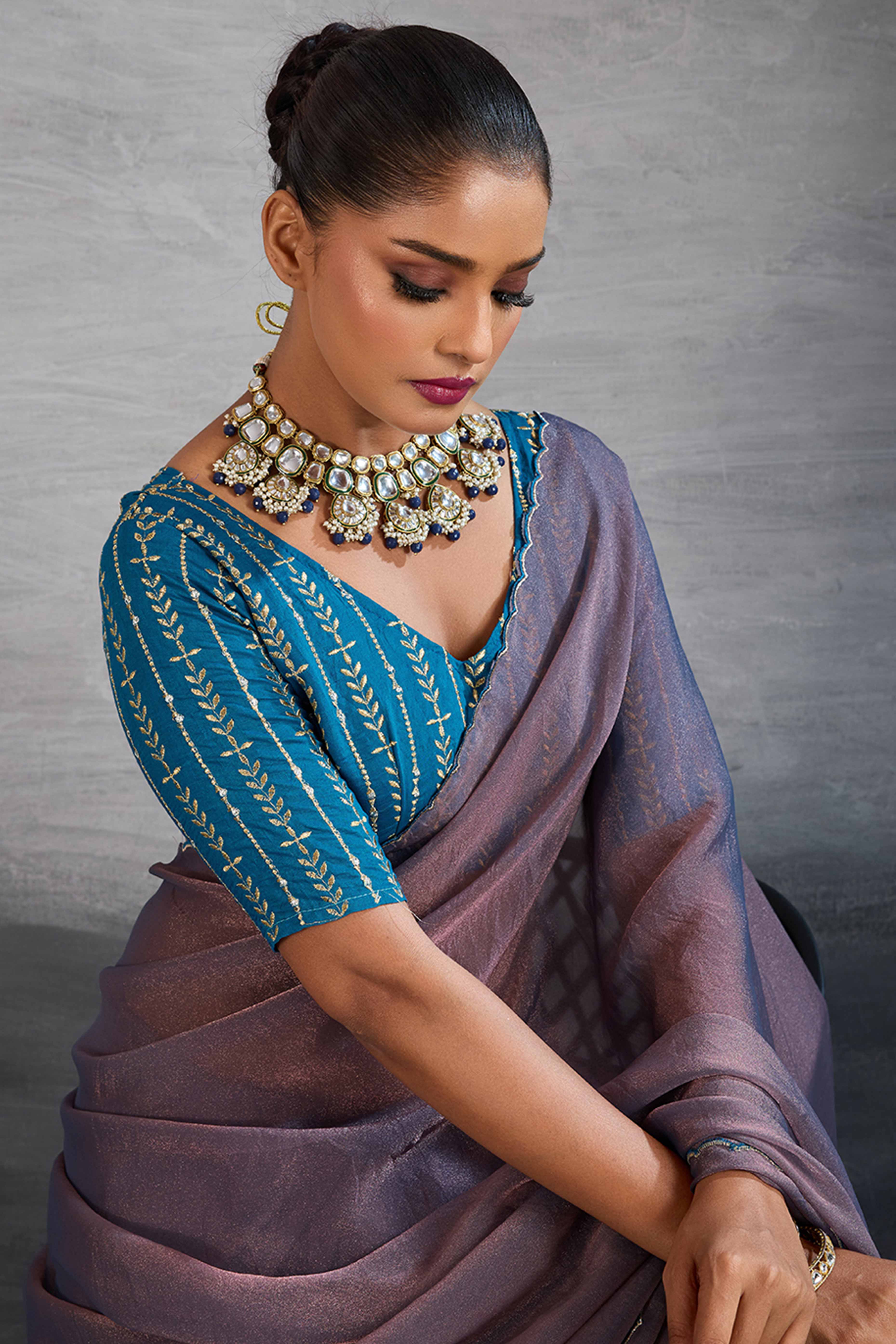 Mauve Solid Organza Jimmy Choo Saree Accentuated With Elegant Cutwork Border Detailing