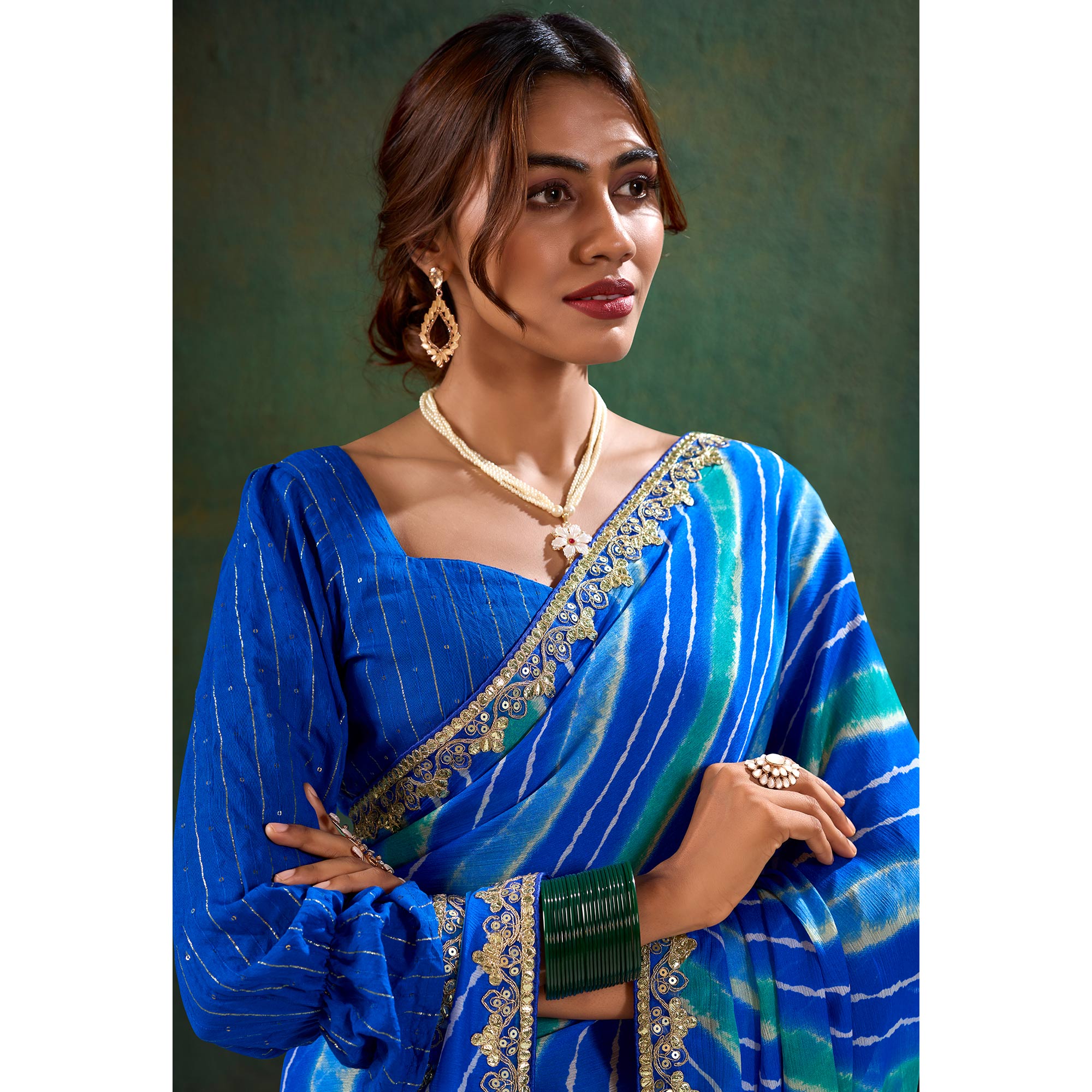 Blue Printed Chiffon Saree With Sequins Border