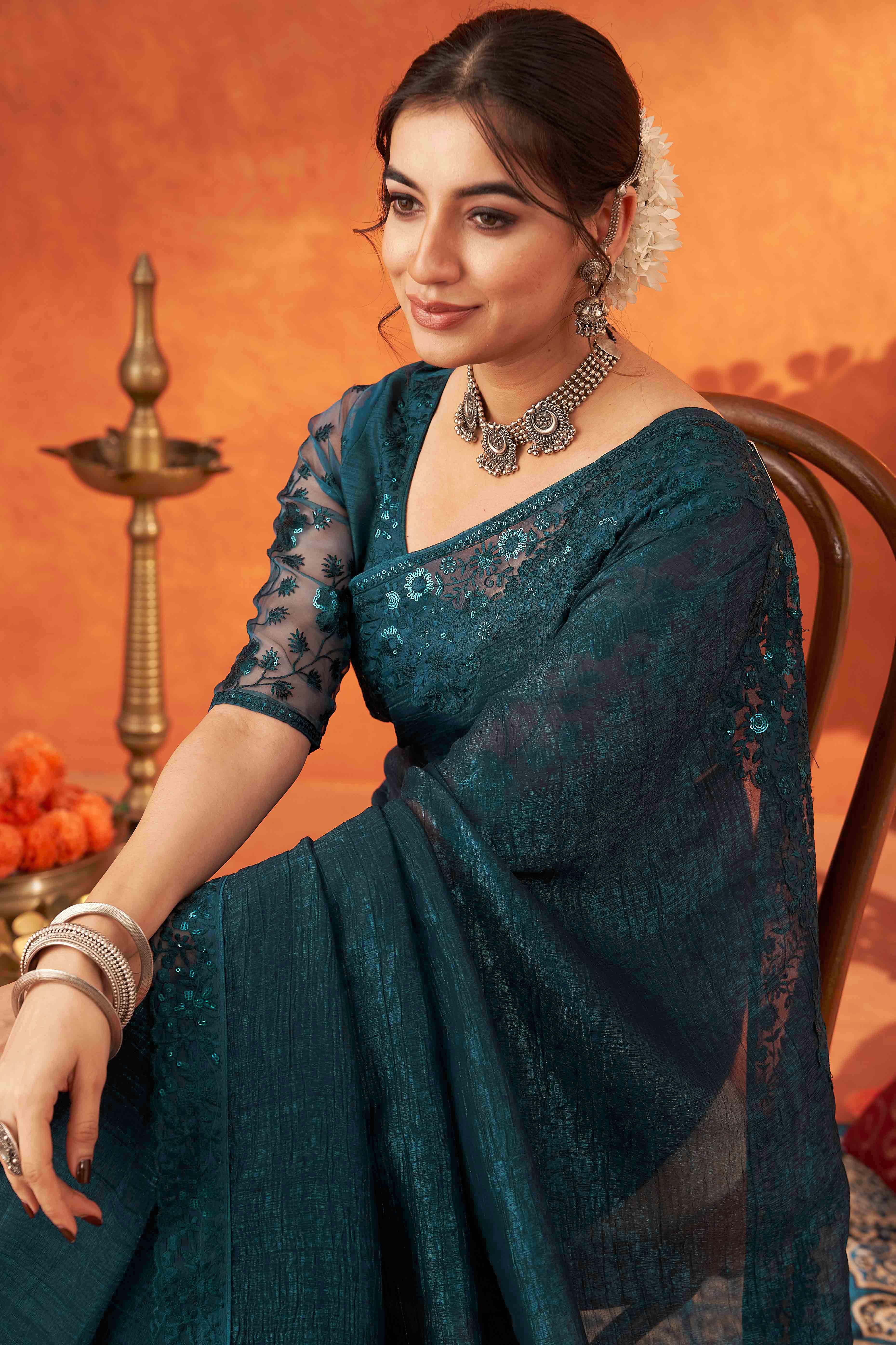 Teal Embroidered Crunchy Soft Net Saree With Embellished Border