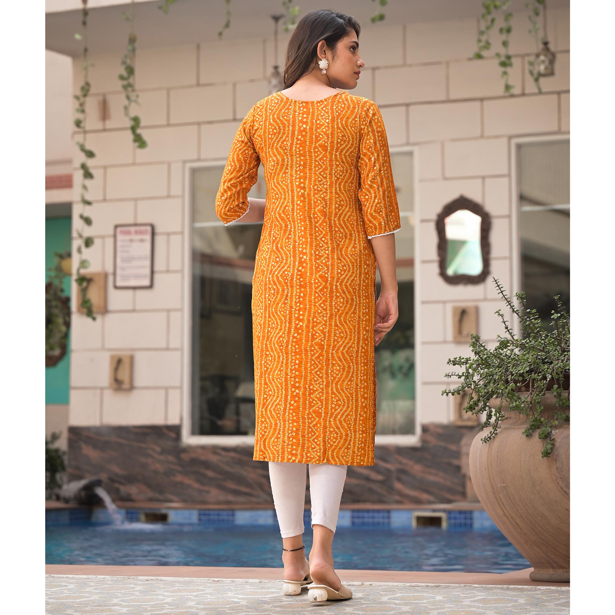 Mustard Foil Bandhani Printed With Embroidered Rayon Kurti