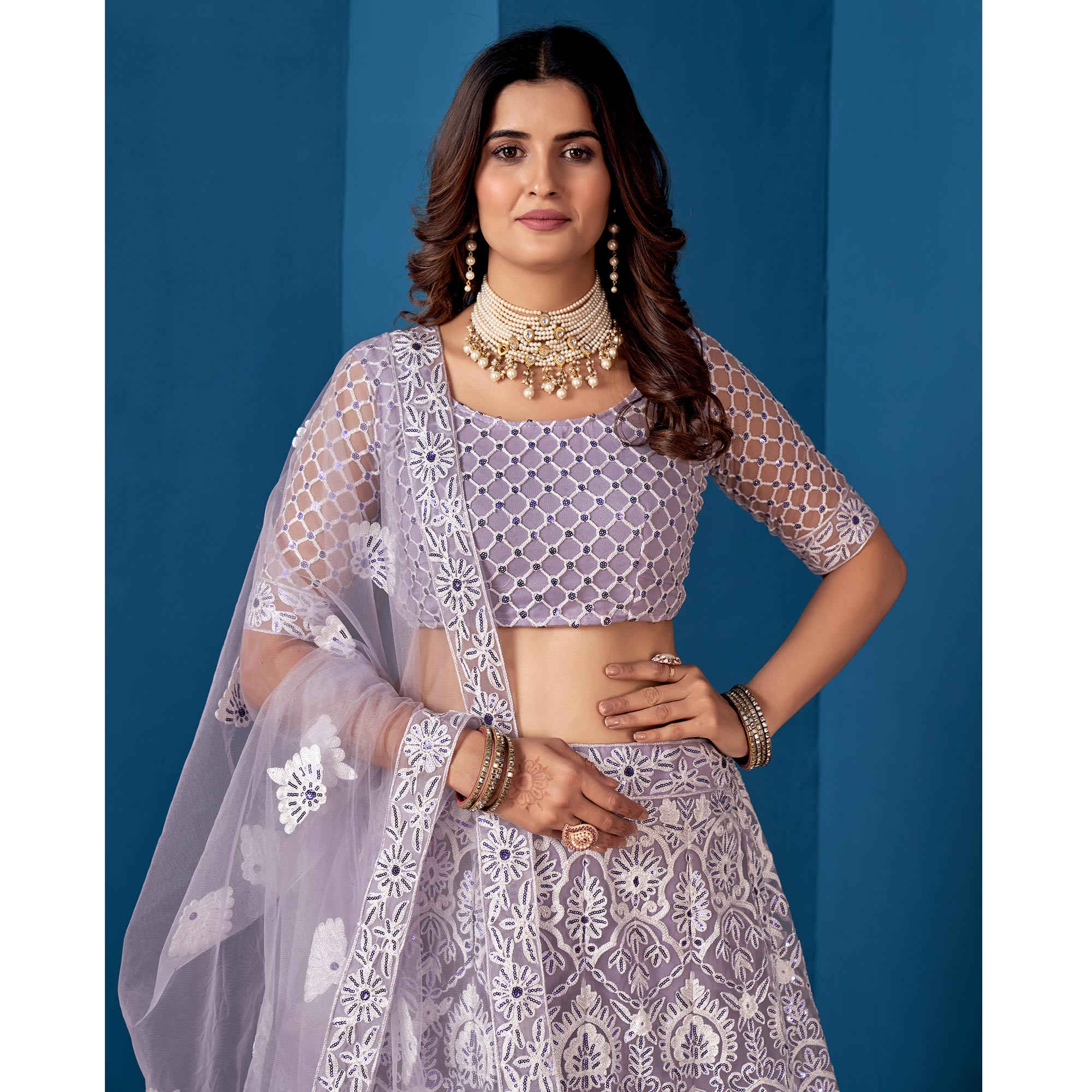 Purple Floral Sequins Embroidered Net Lehenga Choli