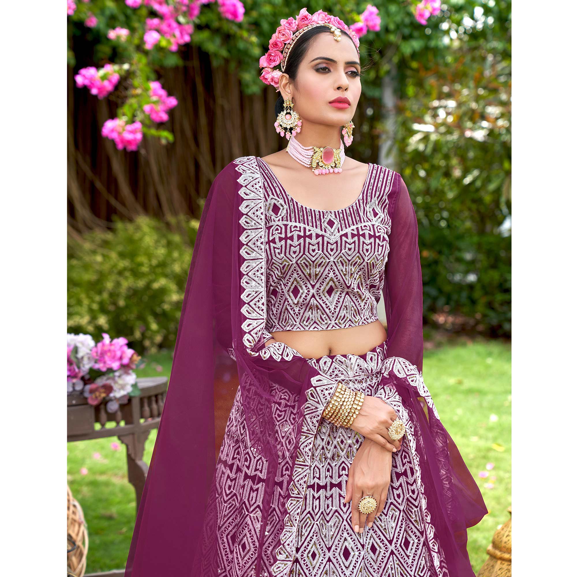 Wine Sequins Embroidered Net Semi Stitched Lehenga Choli