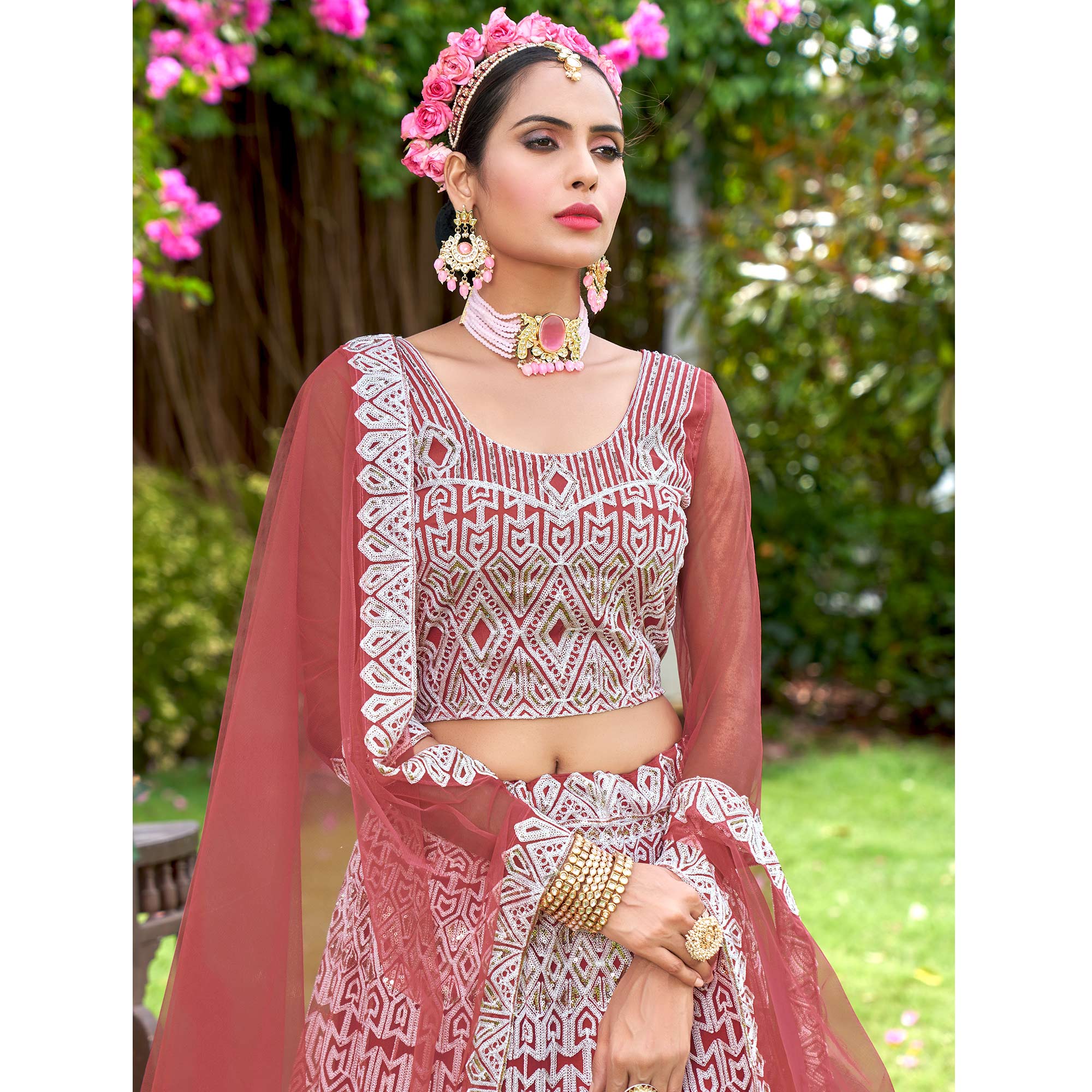 Rust Sequins Embroidered Net Semi Stitched Lehenga Choli