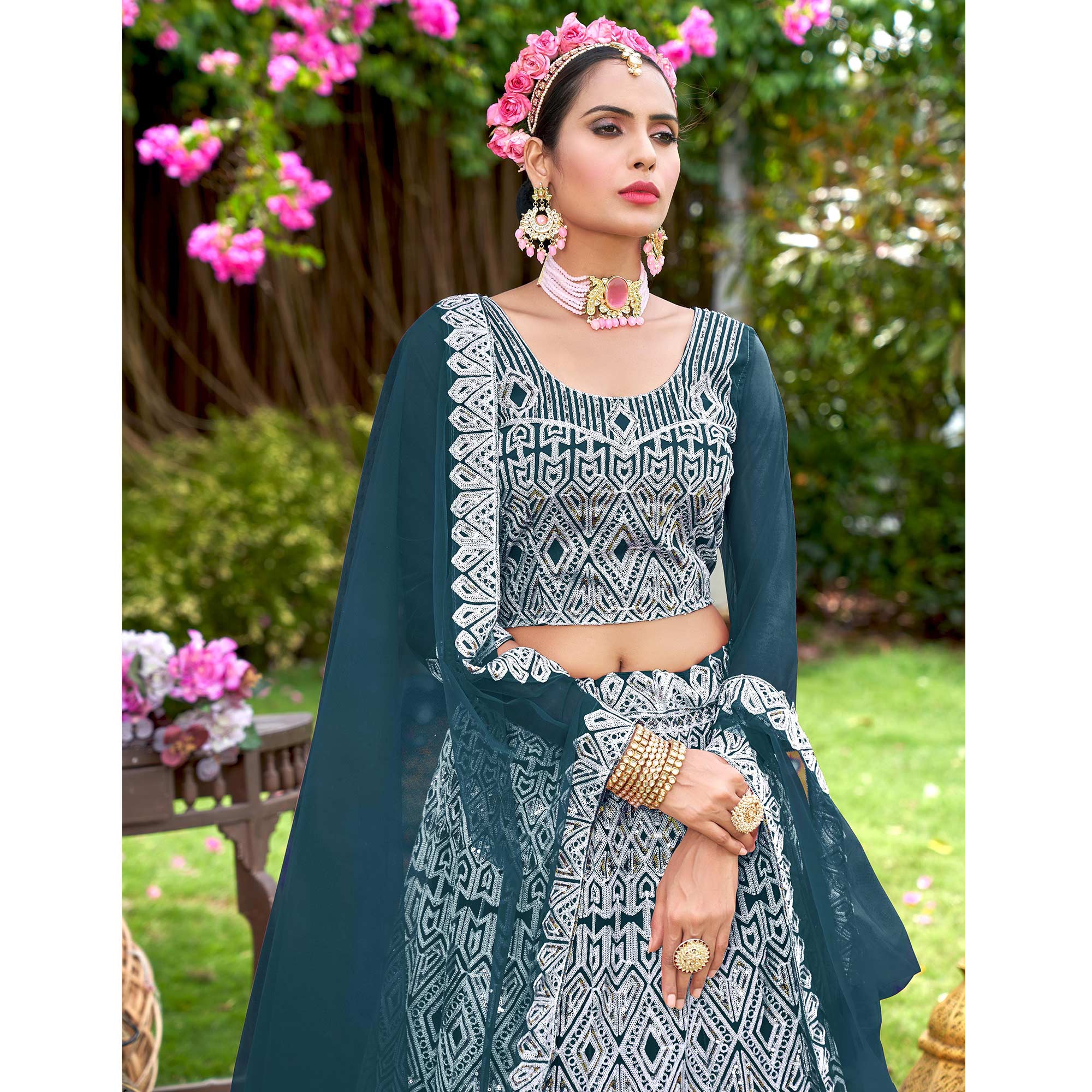 Teal Sequins Embroidered Net Semi Stitched Lehenga Choli