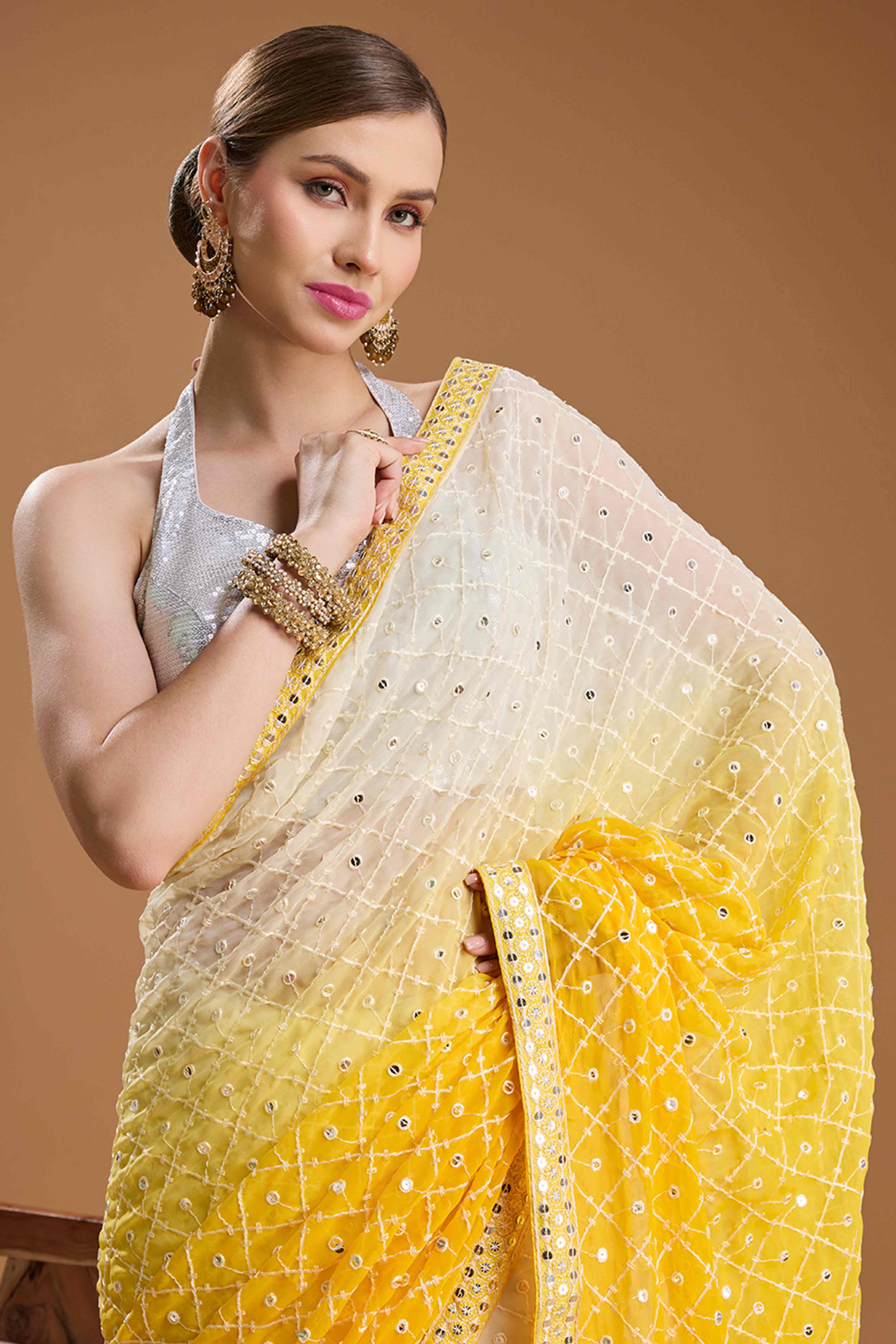 Yellow Georgette Saree Enhanced with Elegant Sequins Embellishments