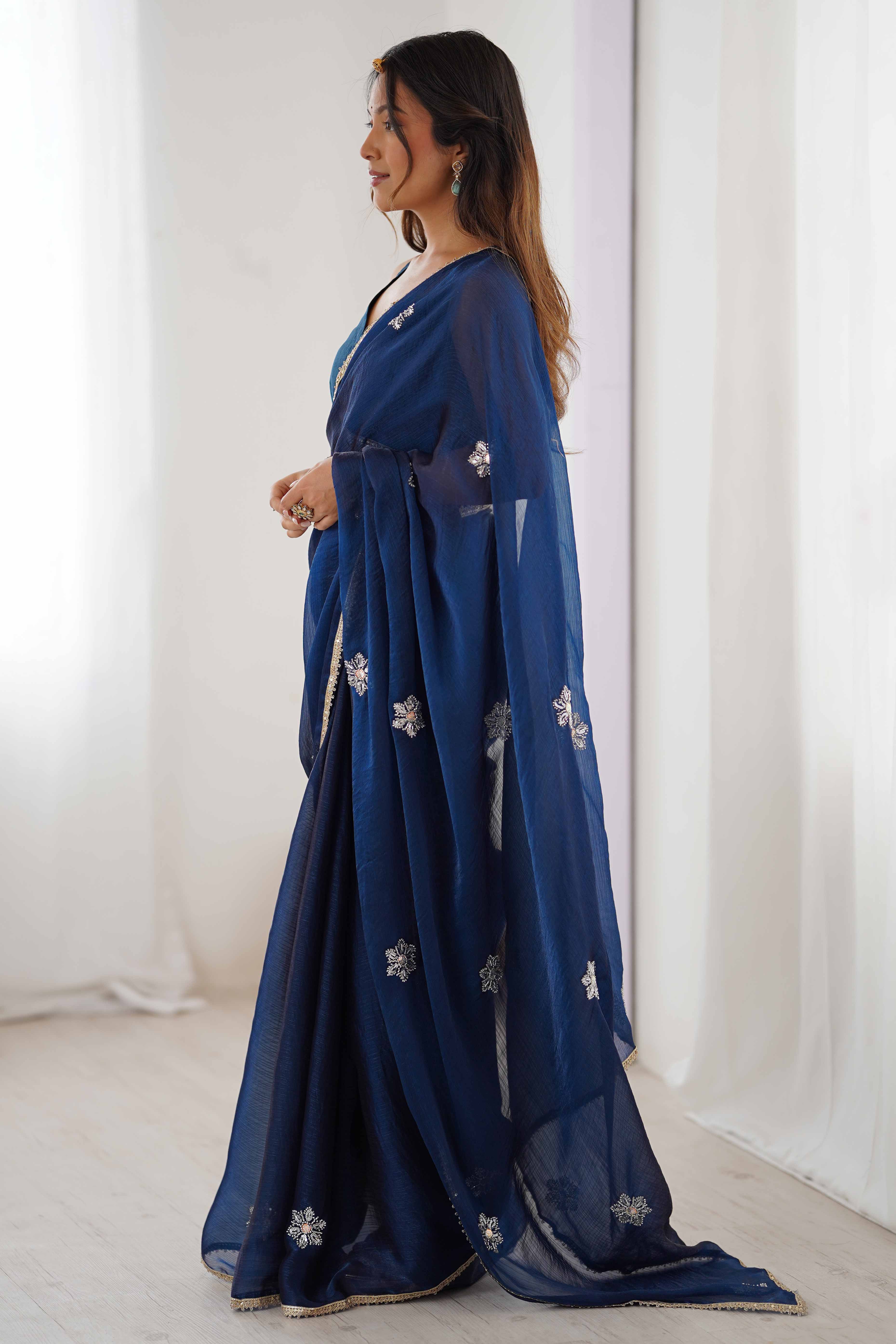 Blue Organza Saree Embellished with Intricate Floral Work and Elegant Lace Detailing