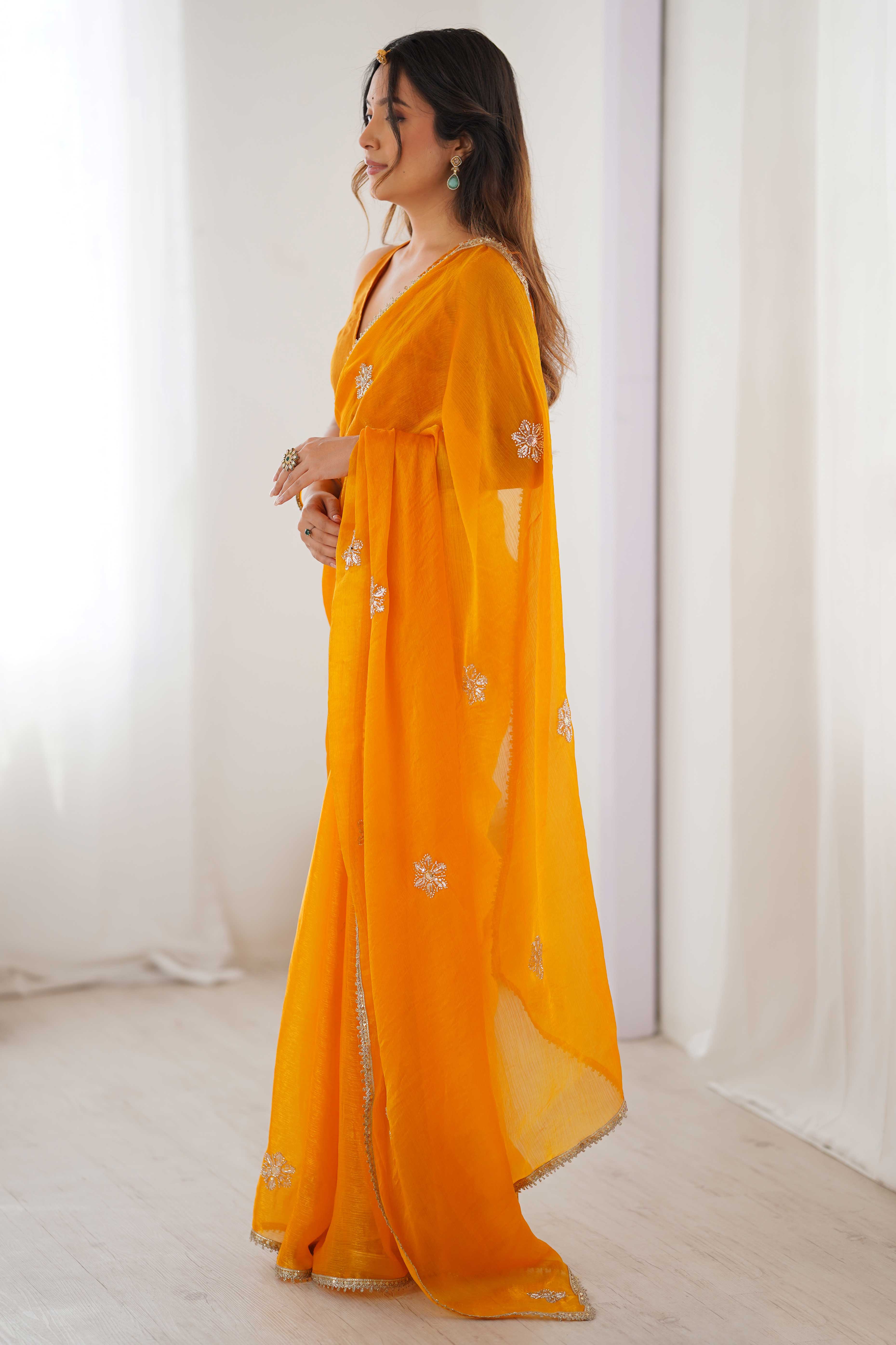 Mustard Yellow Organza Saree Embellished with Intricate Floral Work and Elegant Lace Detailing