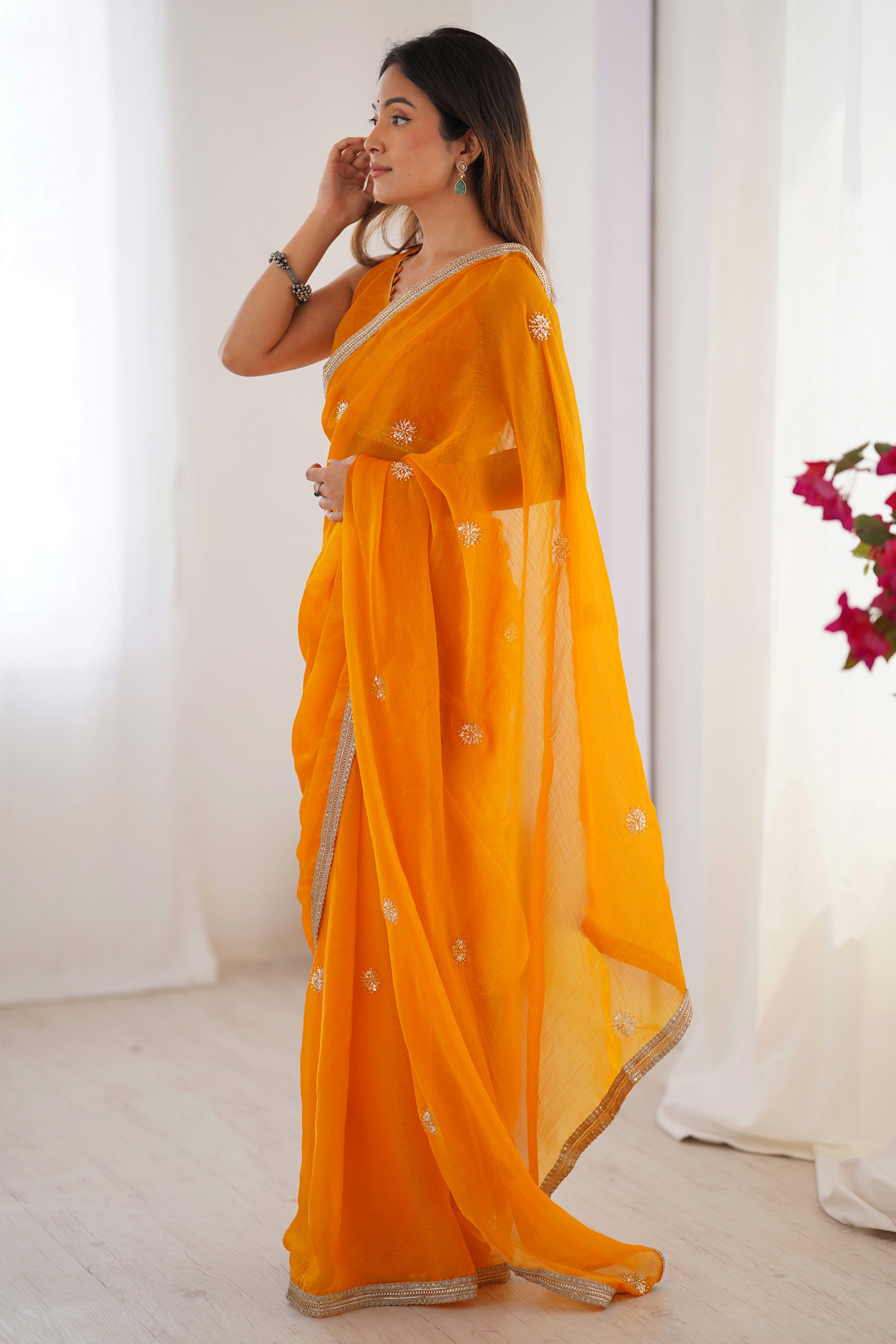 Elegant Mustard Yellow Organza Saree with Delicate Floral Embellishments and Lace Border
