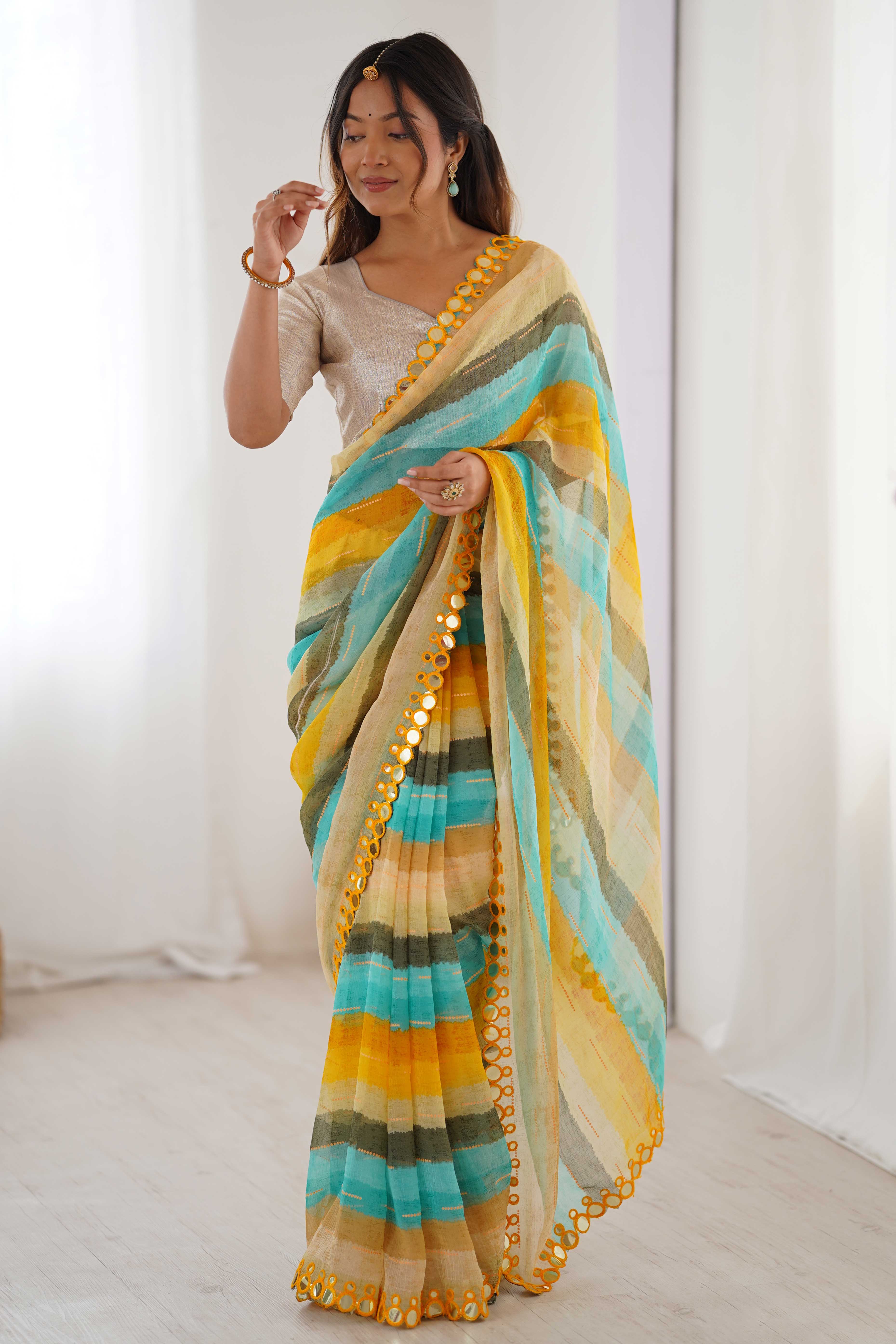 Soft Chiffon Yellow Saree Featuring Classic Leheriya and Mirror Work Edges