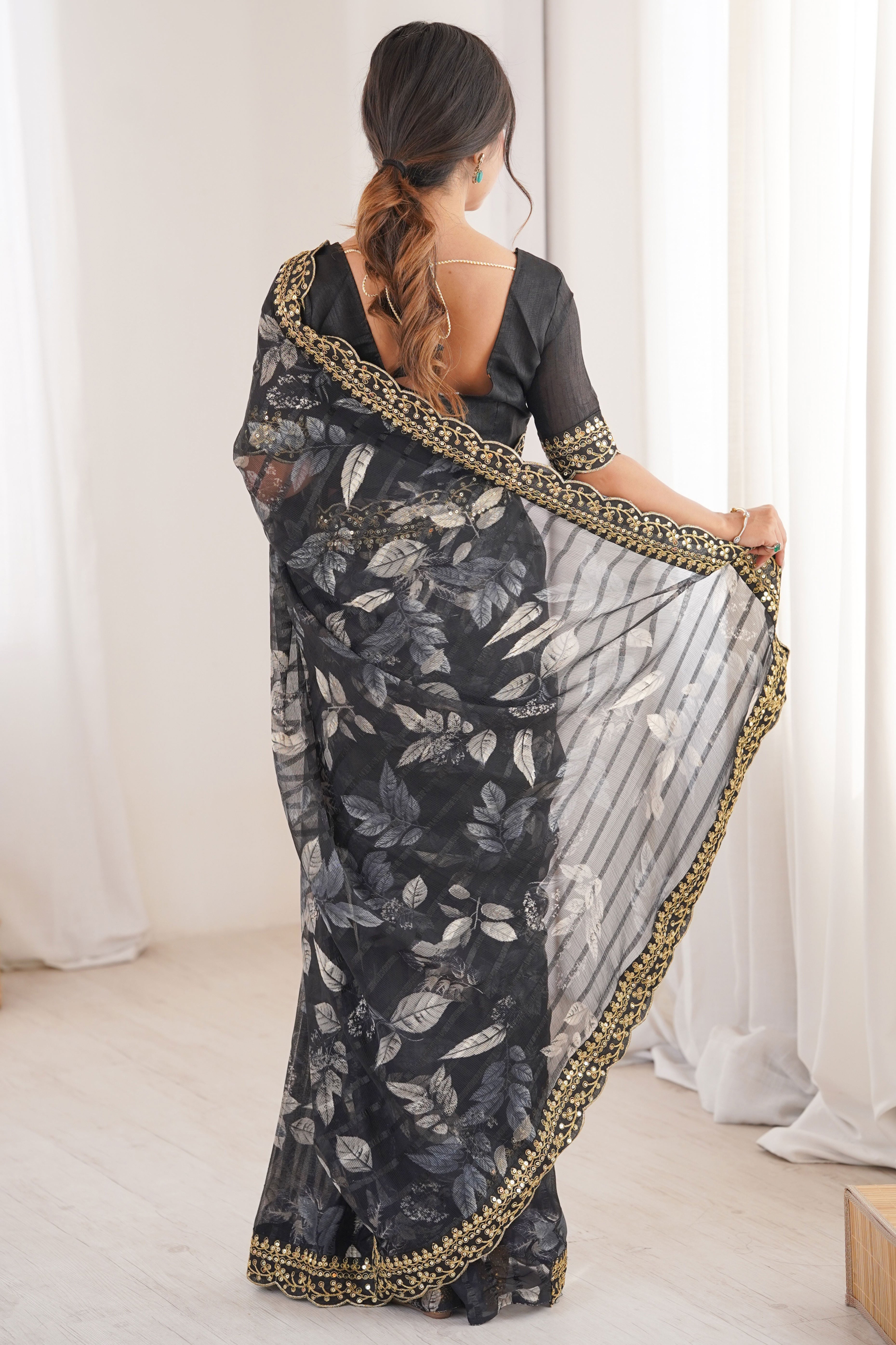 Elegant Black Leaf & Floral Print Georgette Saree With Intricate Cording Sequins Embroidery Border
