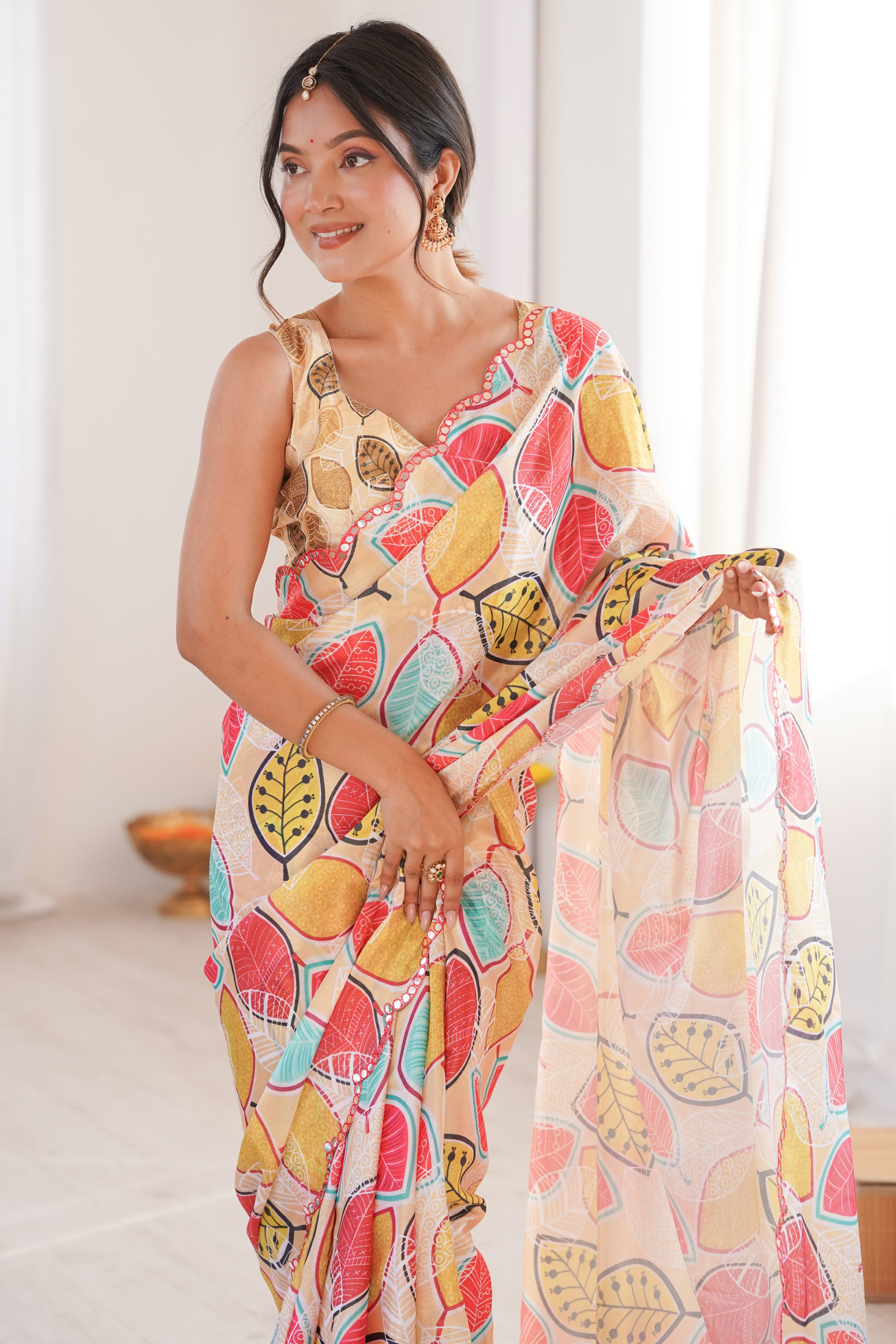 Sophisticated Light Yellow Leaf Digital Printed Chinon Saree Highlighted By Embroidered Border