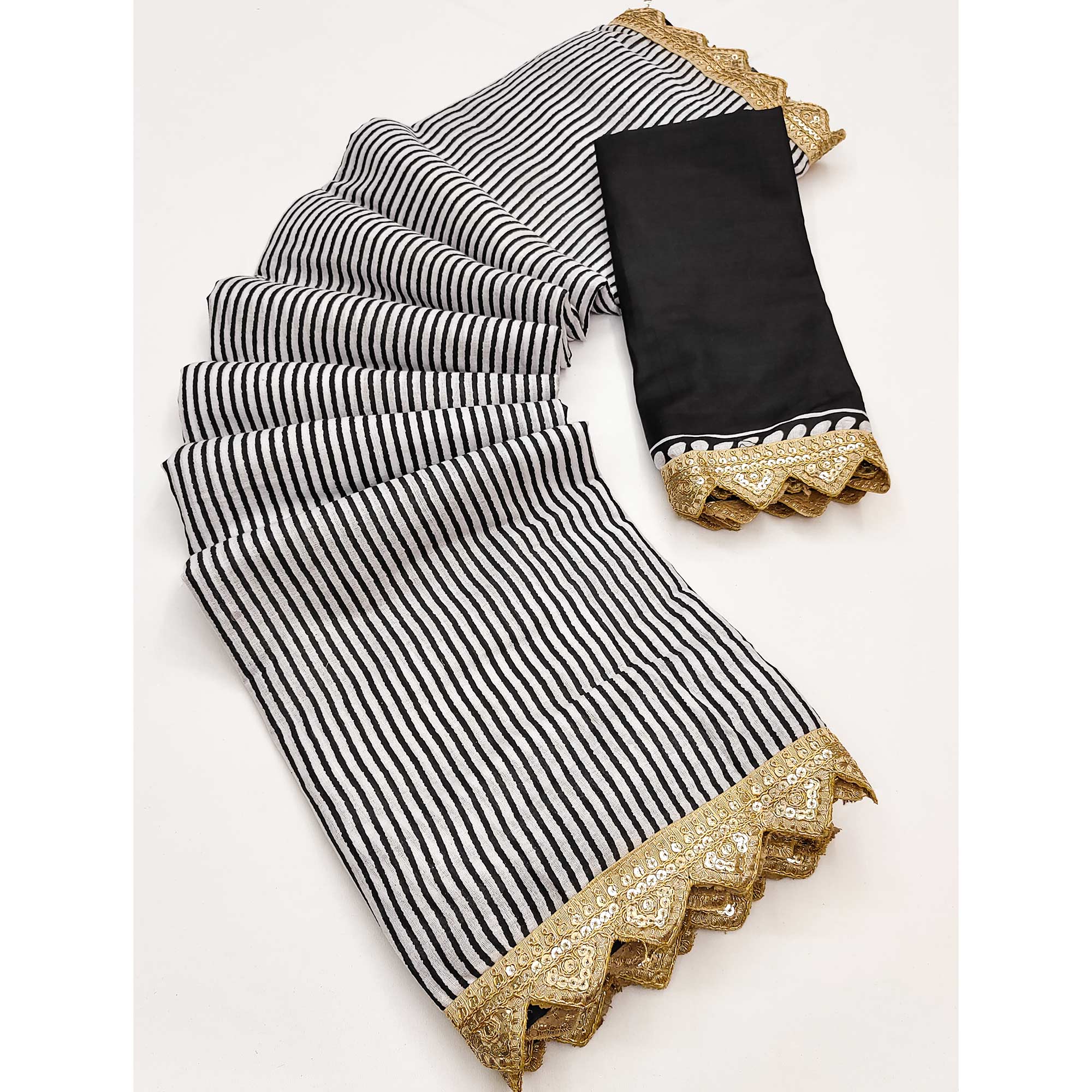 Office-Ready Black & White Mulmul Saree with Print and Embroidery Border