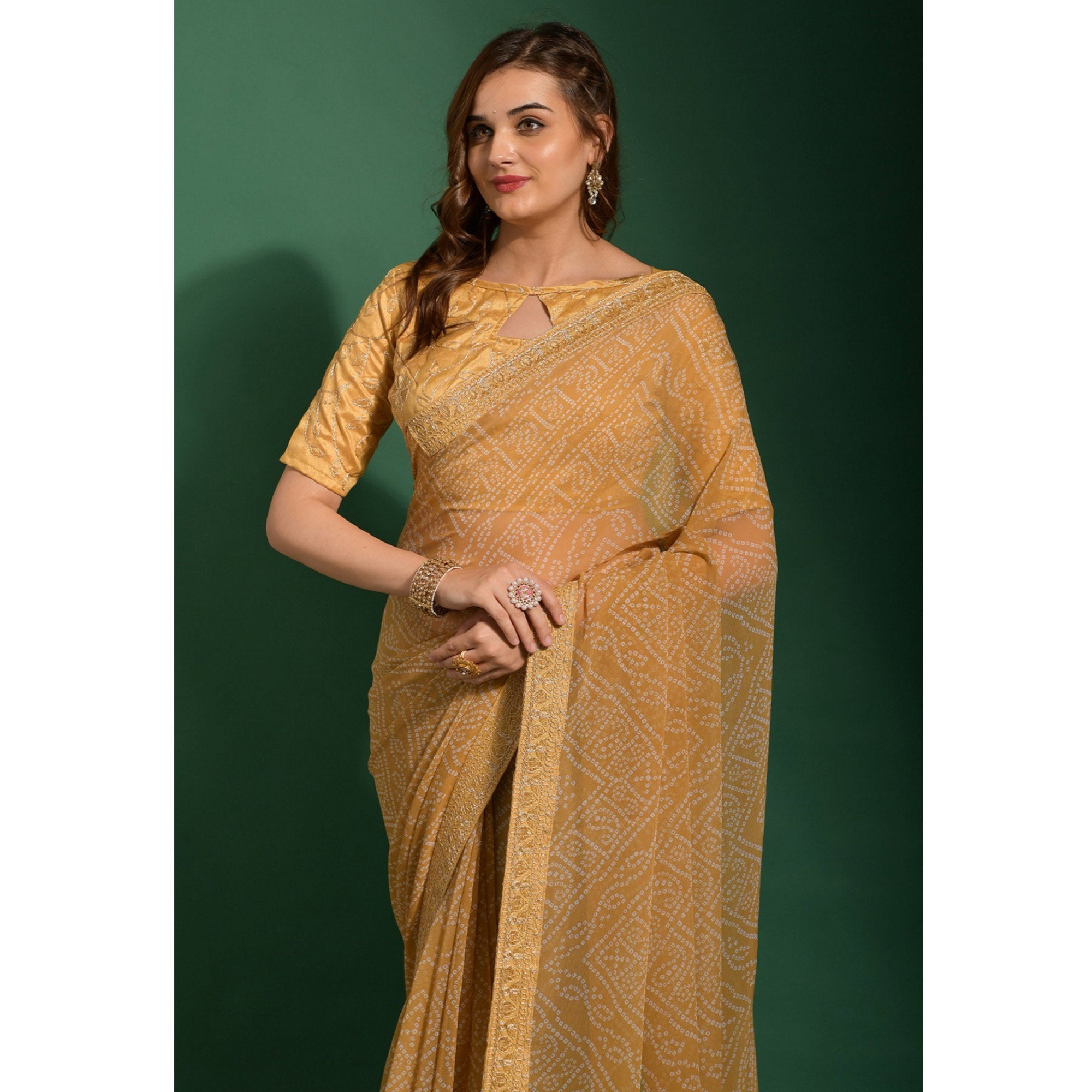 Beige Bandhani Printed Georgette Saree With Embroidered Border