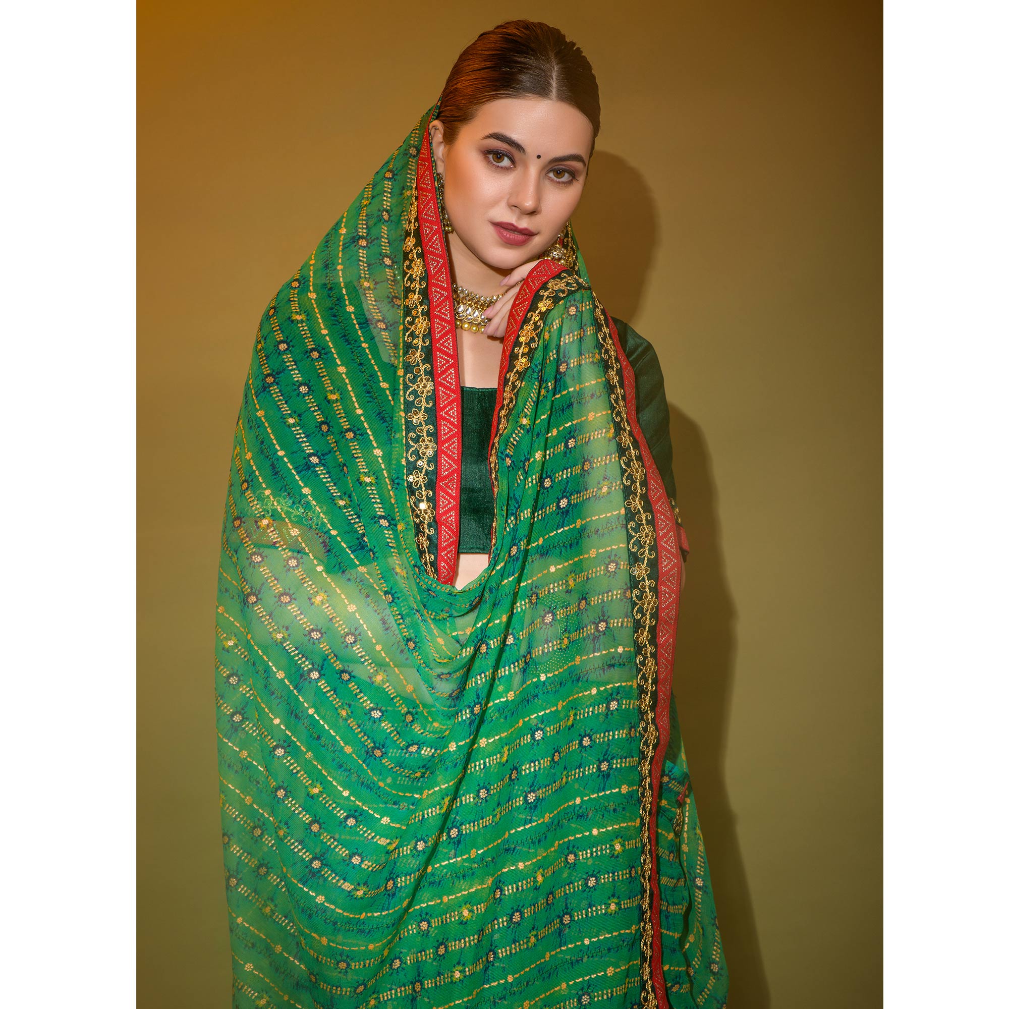 Green Foil Printed Georgette Saree With Embroidered Border