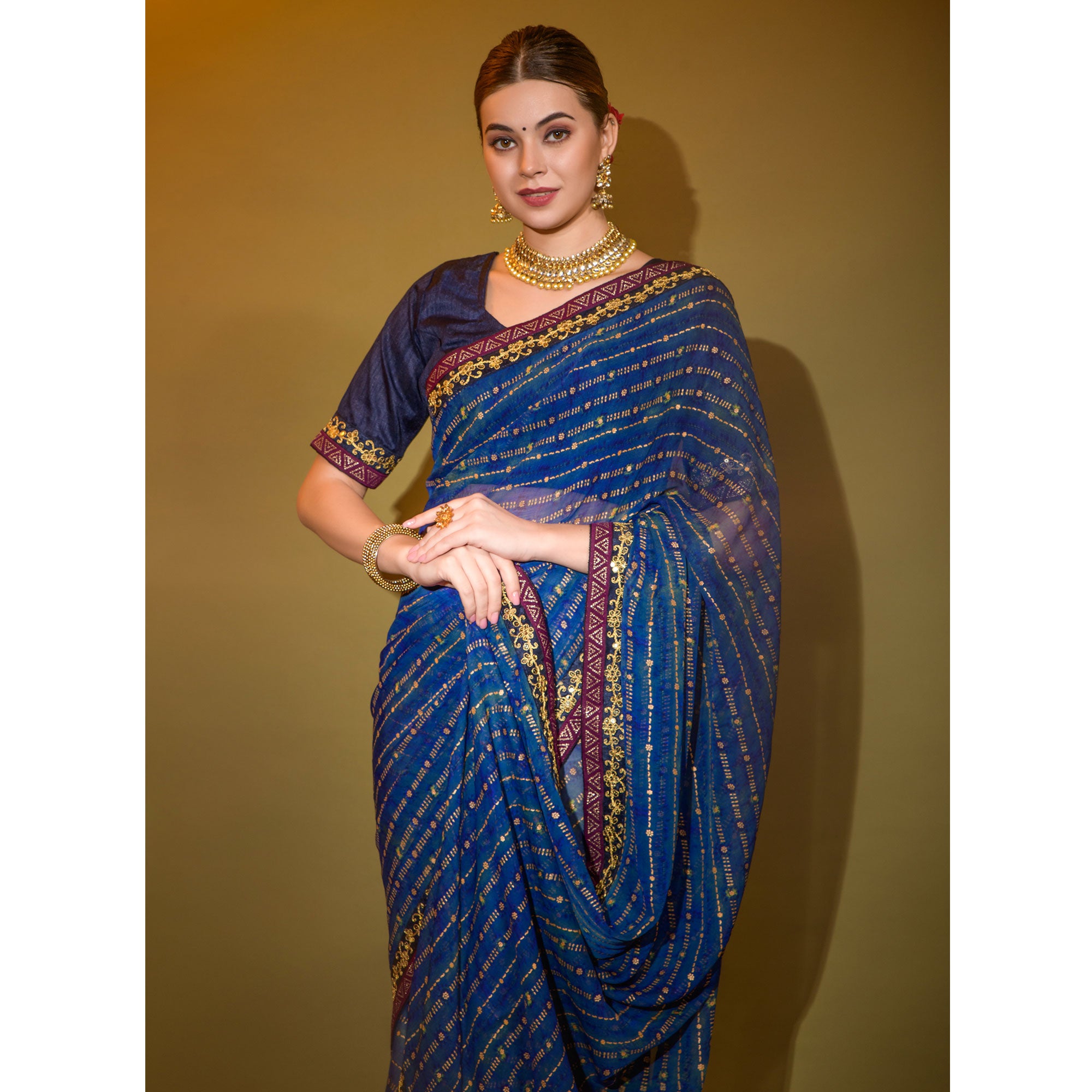 Blue Foil Printed Georgette Saree With Embroidered Border