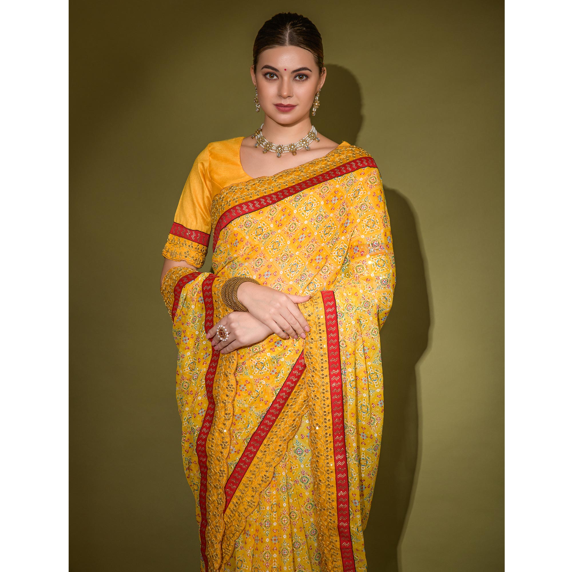 Yellow Patola Foil Printed Georgette Saree with Embroidered Border