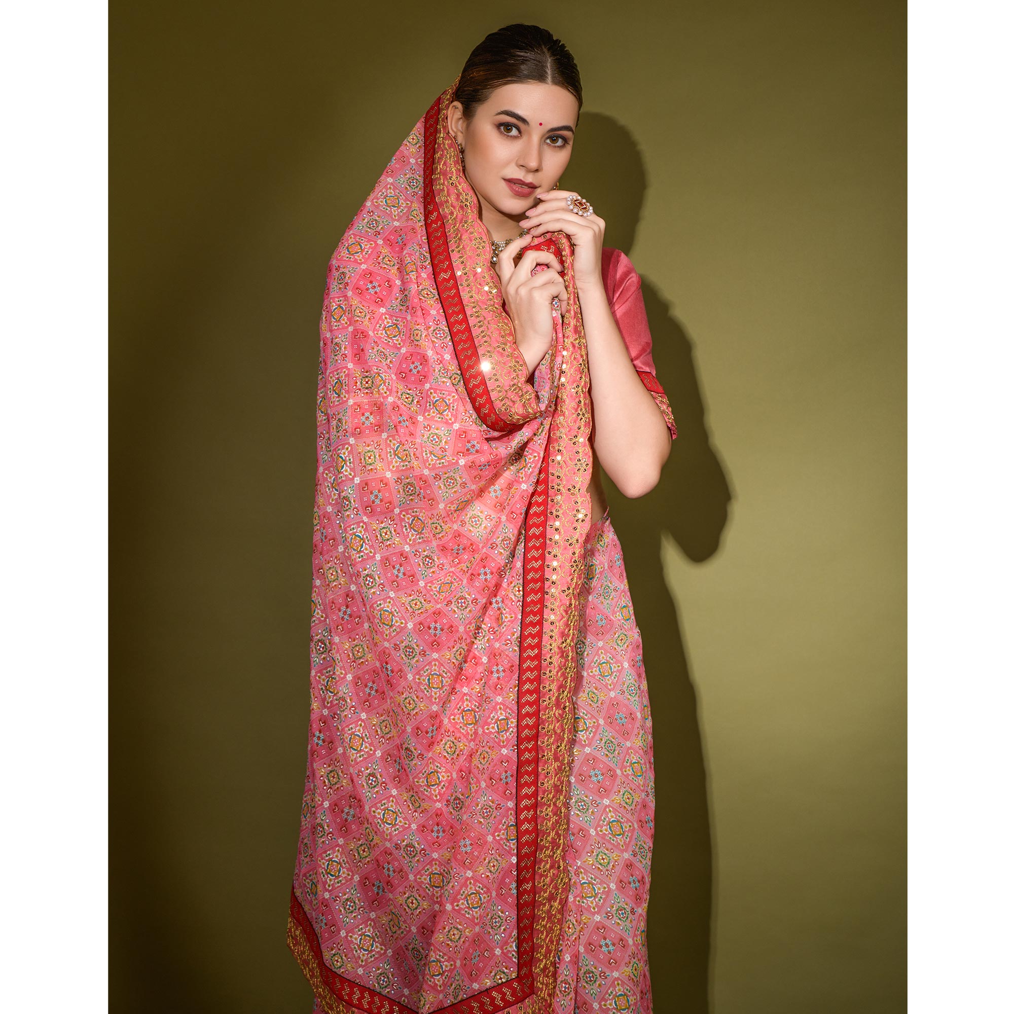 Pink Patola Foil Printed Georgette Saree with Embroidered Border