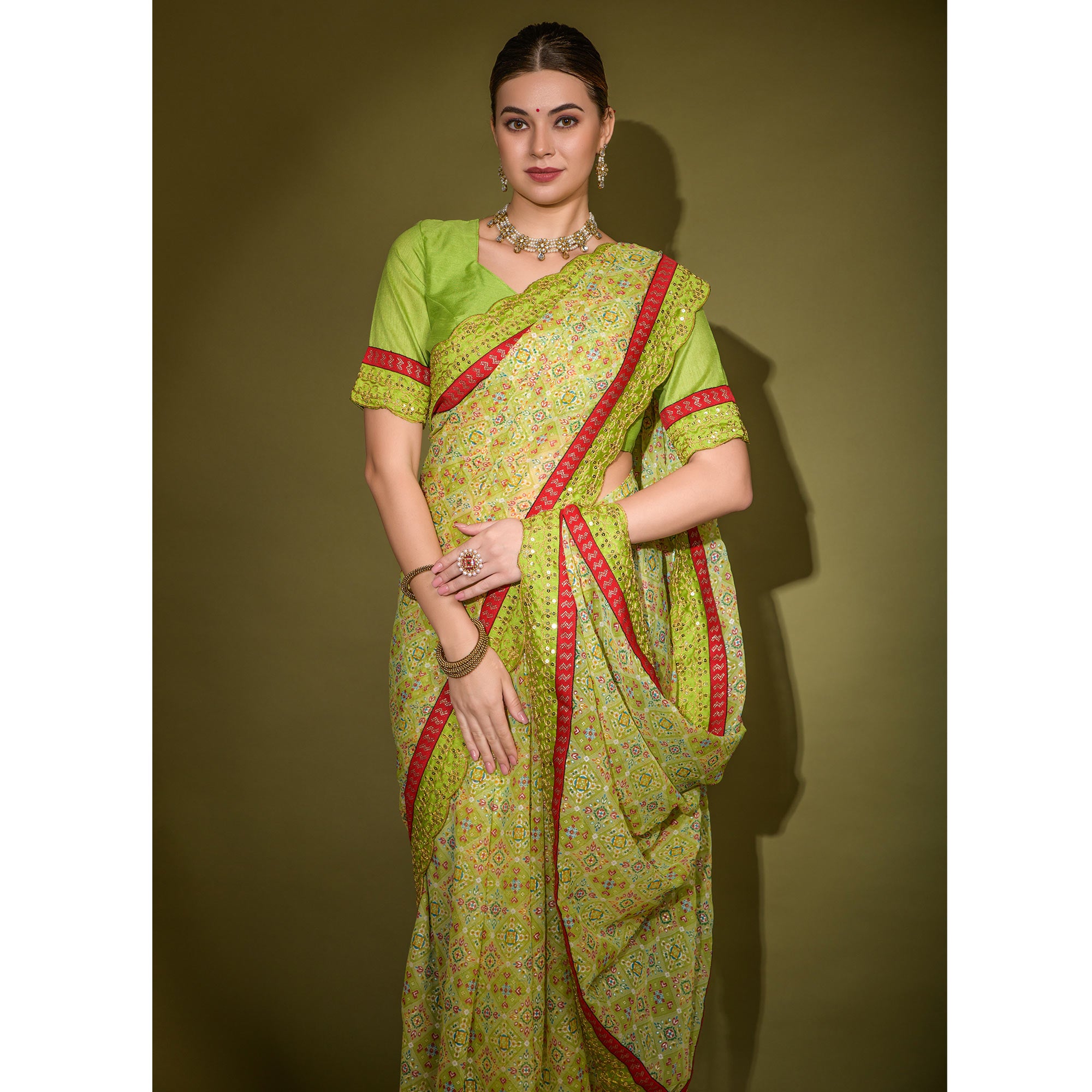 Green Patola Foil Printed Georgette Saree with Embroidered Border