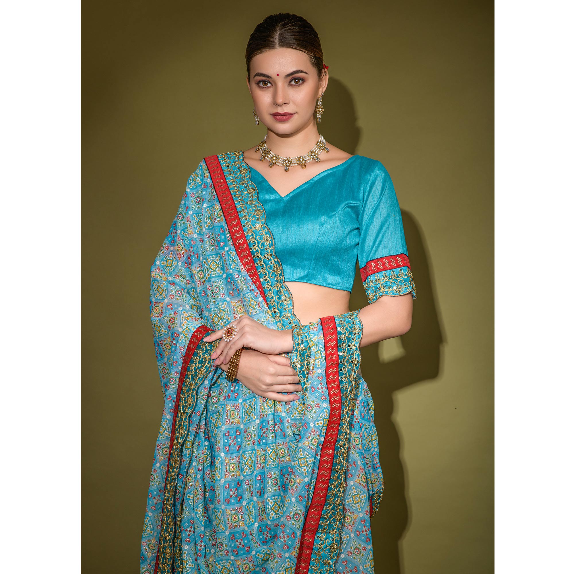 Blue Patola Foil Printed Georgette Saree with Embroidered Border