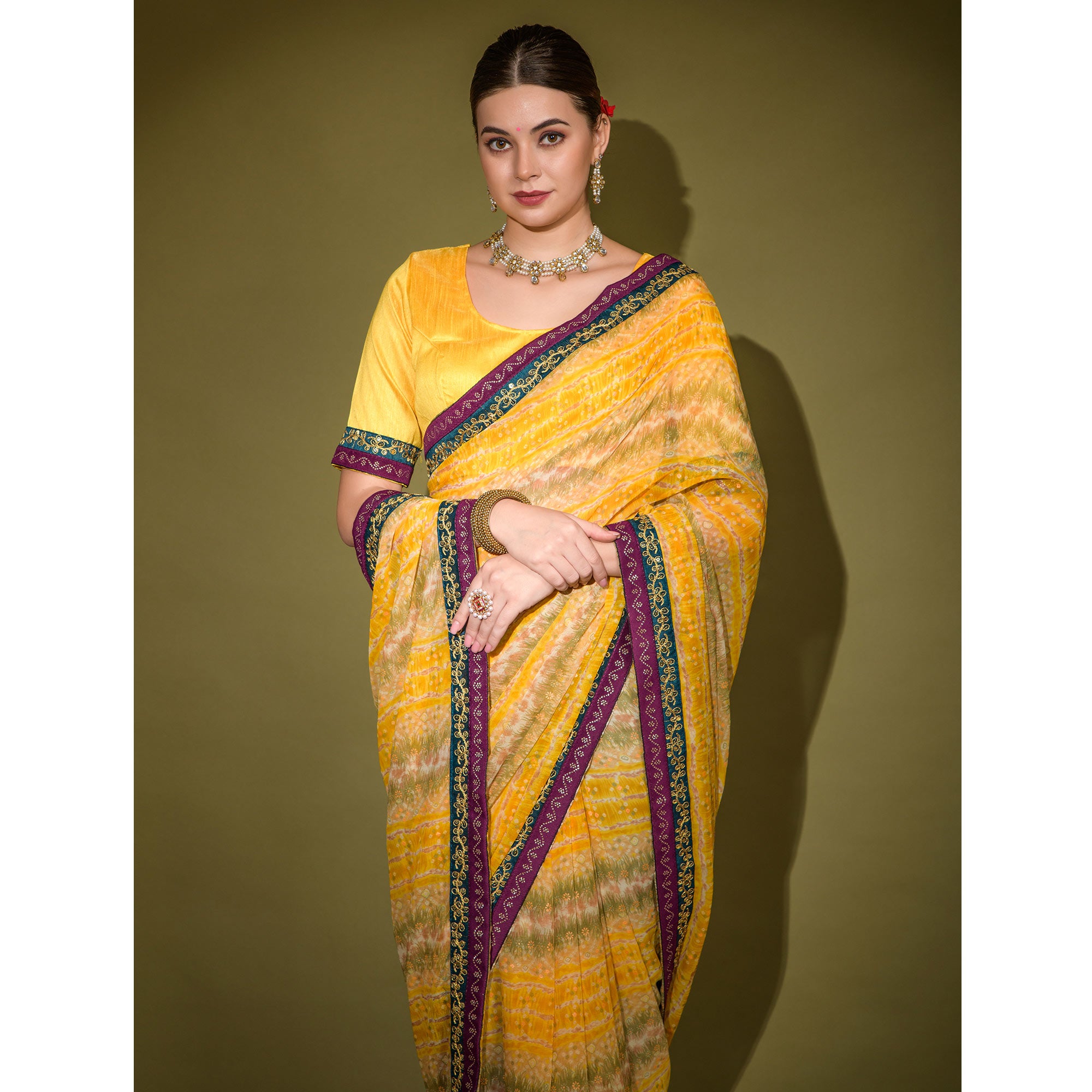 Yellow Leheriya Printed Georgette Saree With Embroidered Border