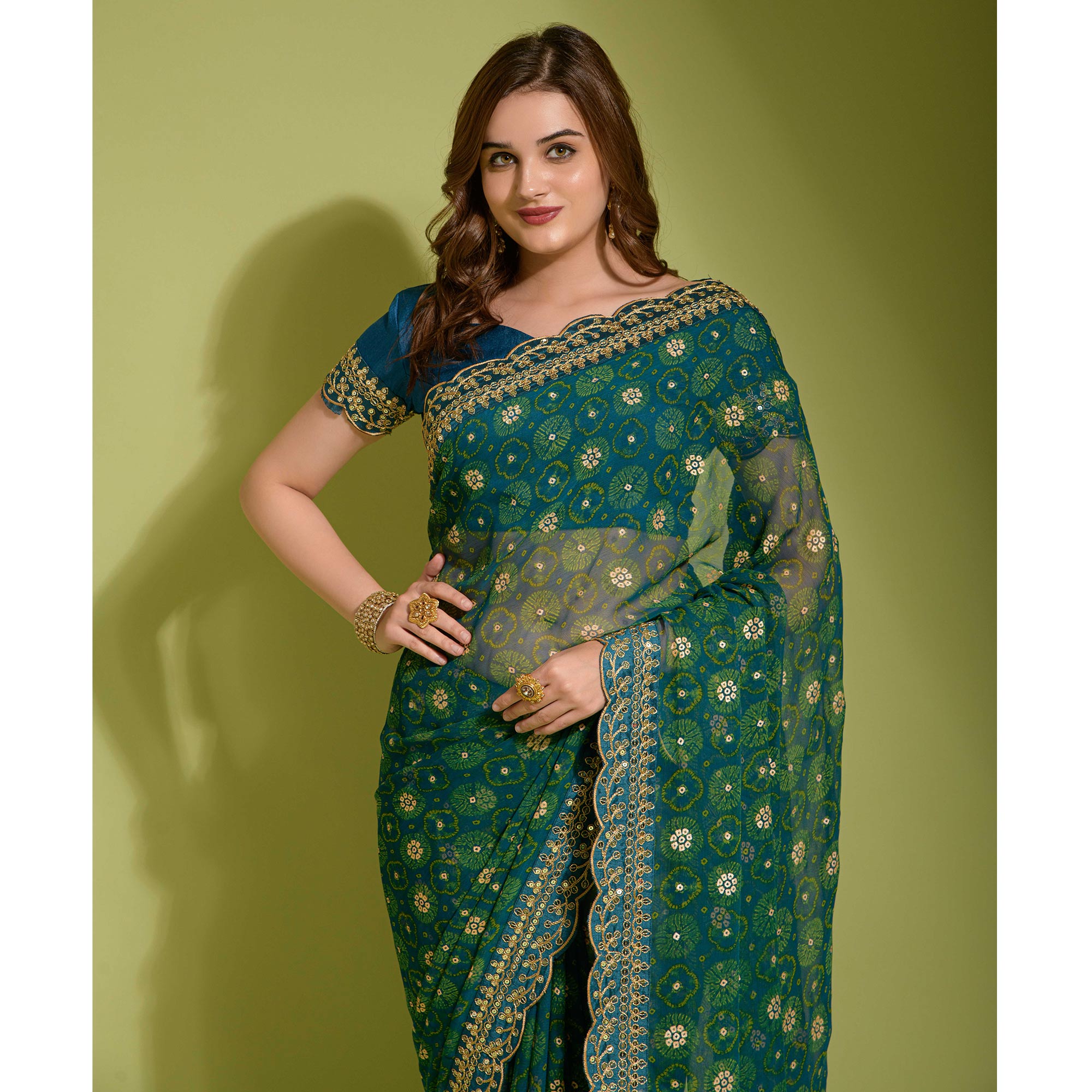 Teal Bandhani Foil Printed Georgette Saree With Embroidered Border