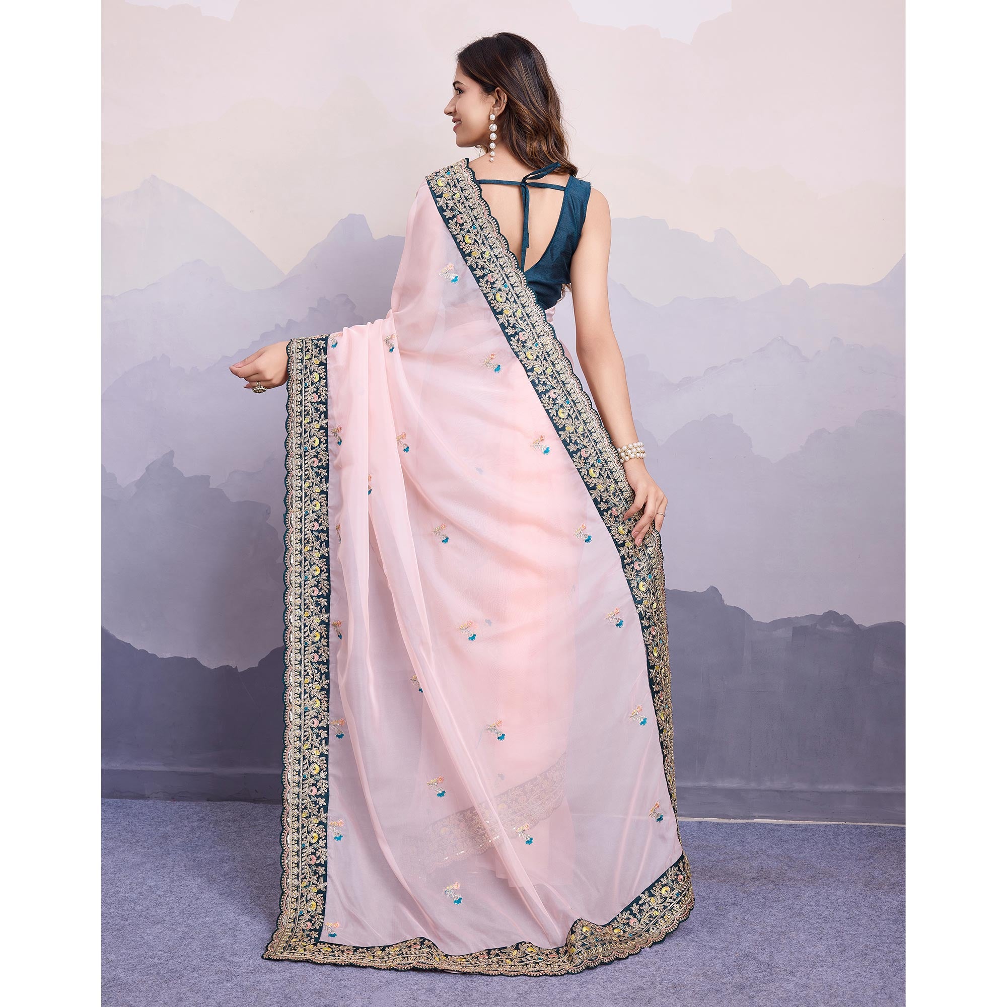 Light Peach Floral Sequins Embroidered Organza Saree With Lace Border