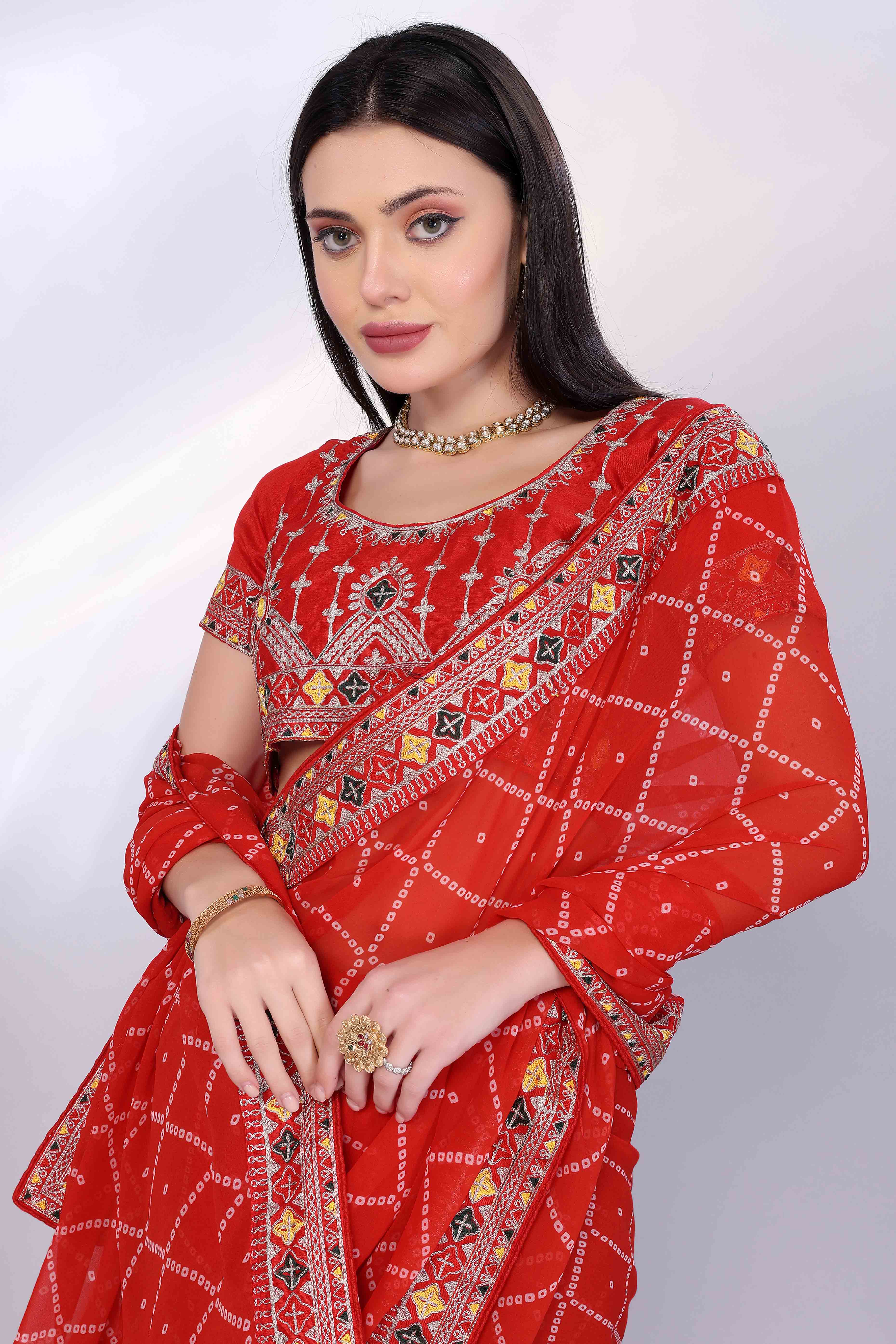 Red Bandhani Printed Georgette Saree Framed With Elegant Embroidered Border