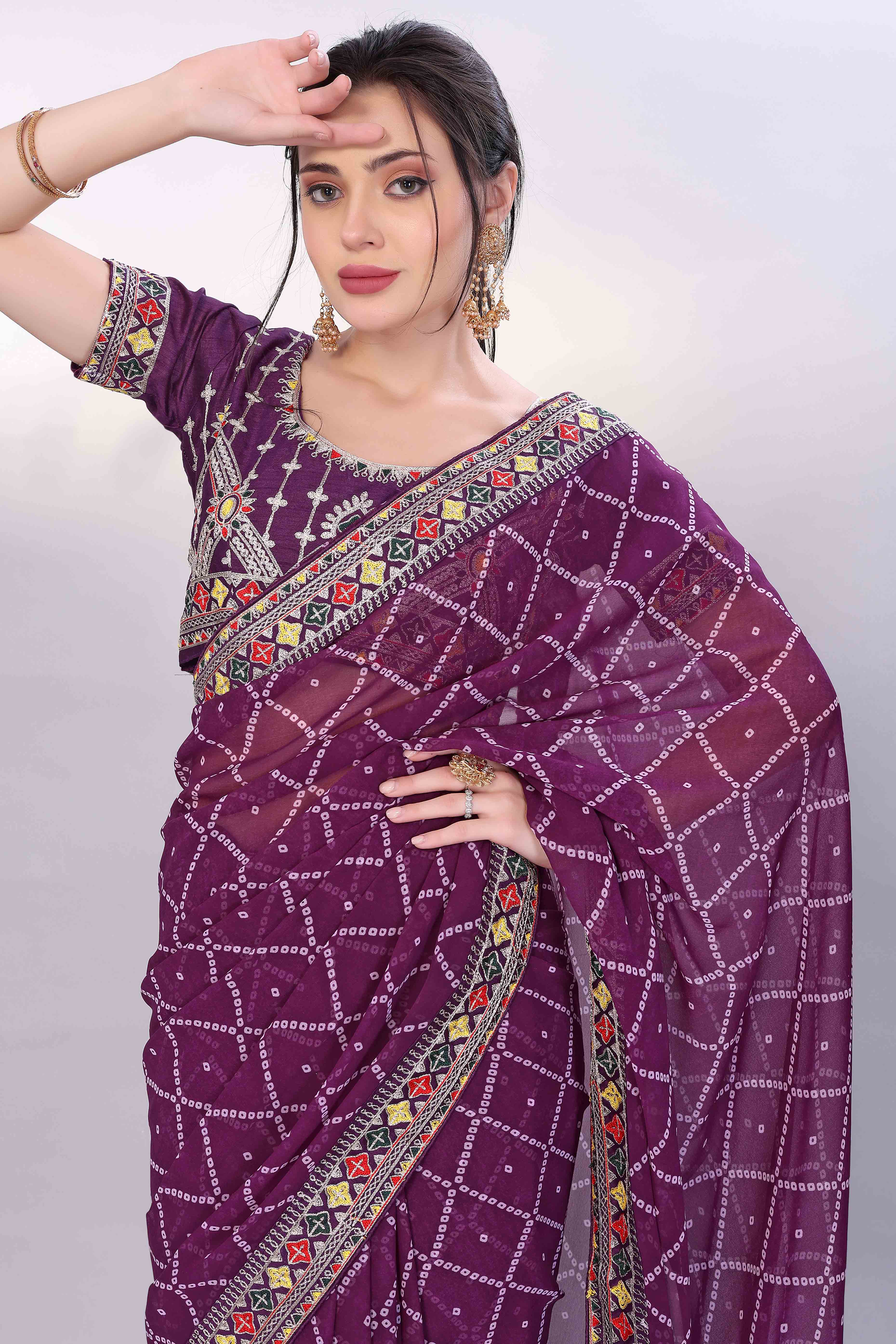 Wine Bandhani Printed Georgette Saree Framed With Elegant Embroidered Border