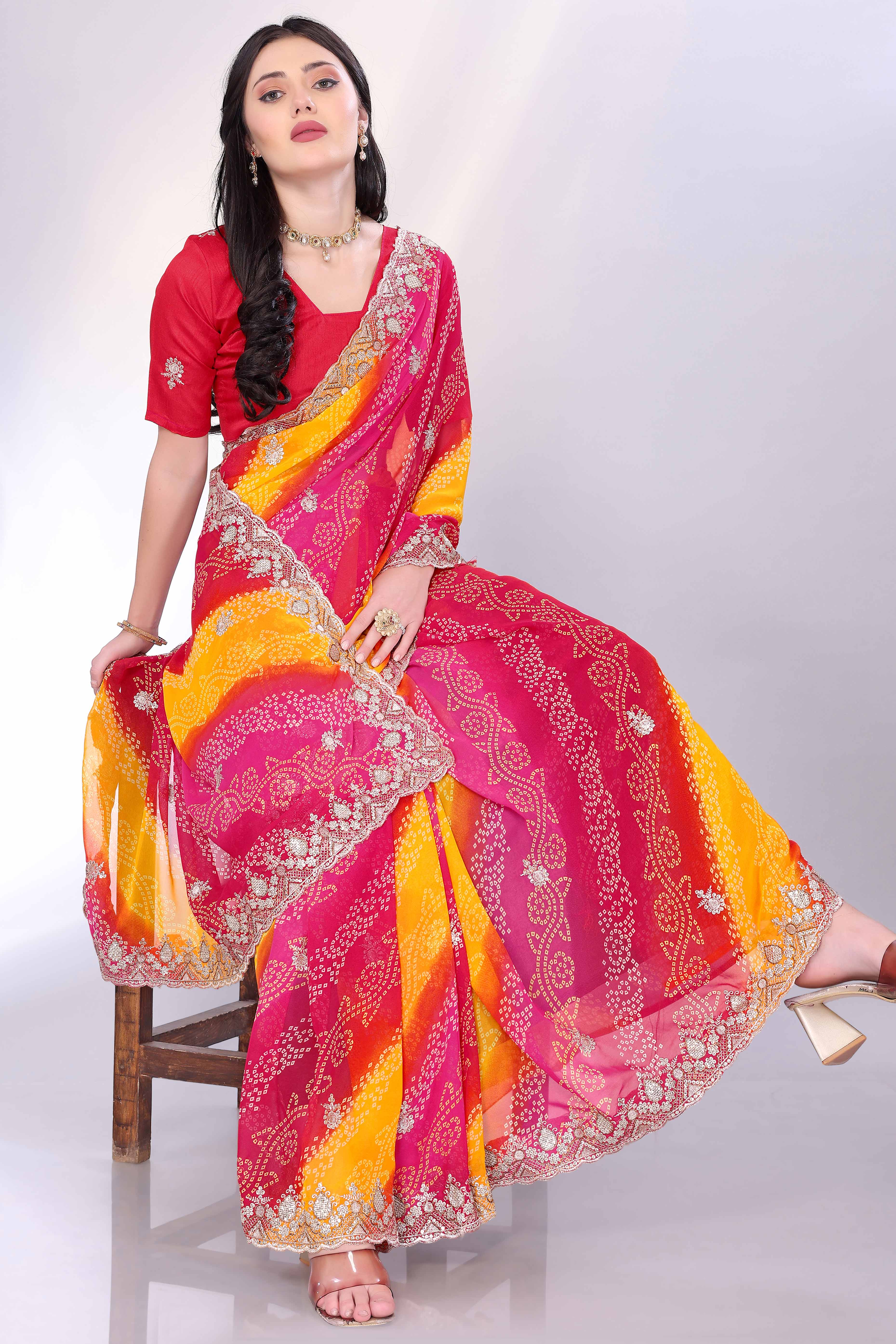 Pink Georgette Saree Showcasing Bandhani Print & Delicate Floral Sequins Embroidery
